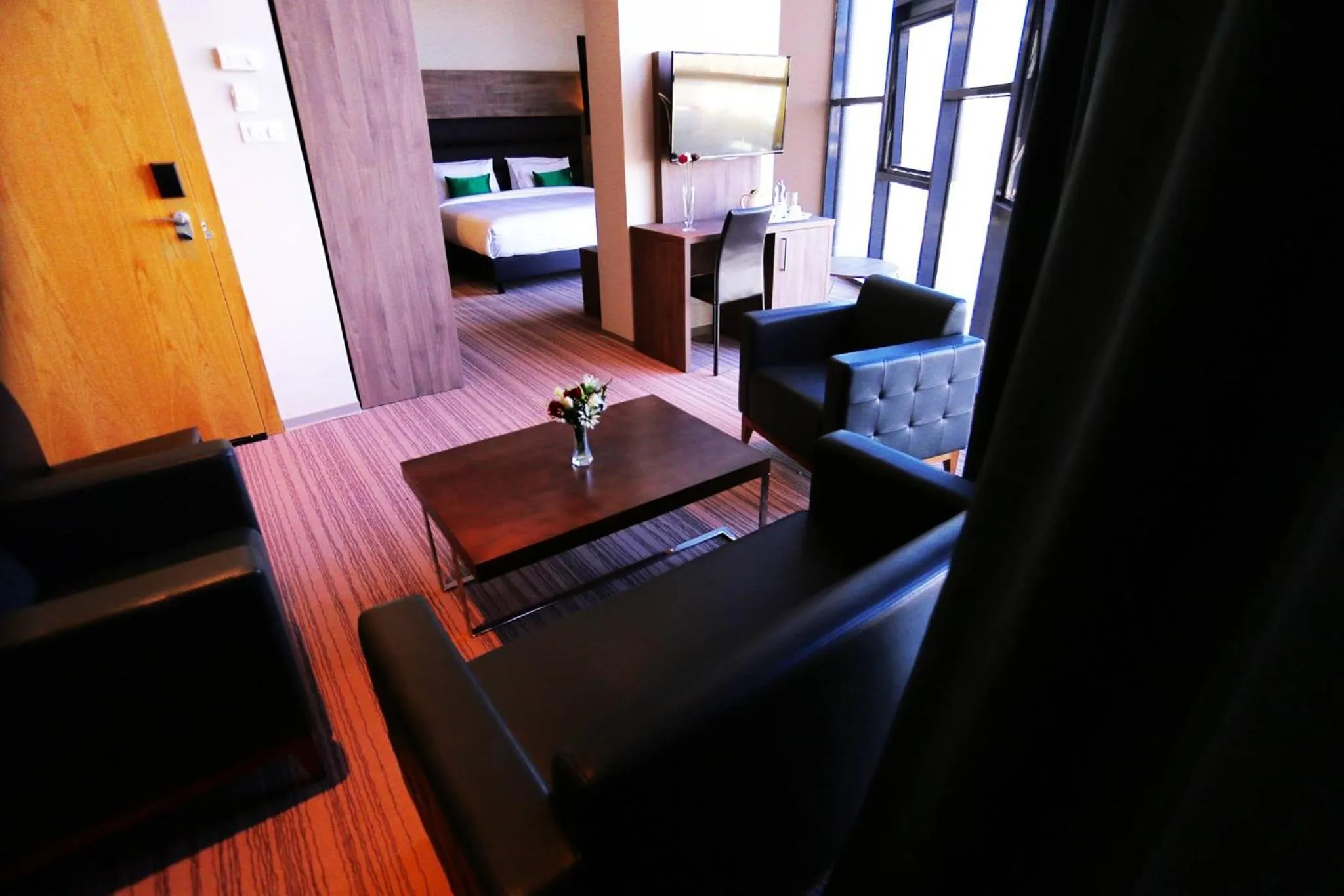 Communal lounge/ TV room, Bed in Le Zenith Hotel Oran