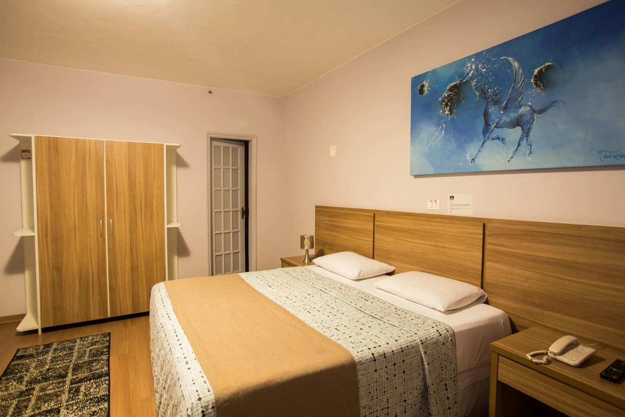 Bed in Gallant Hotel