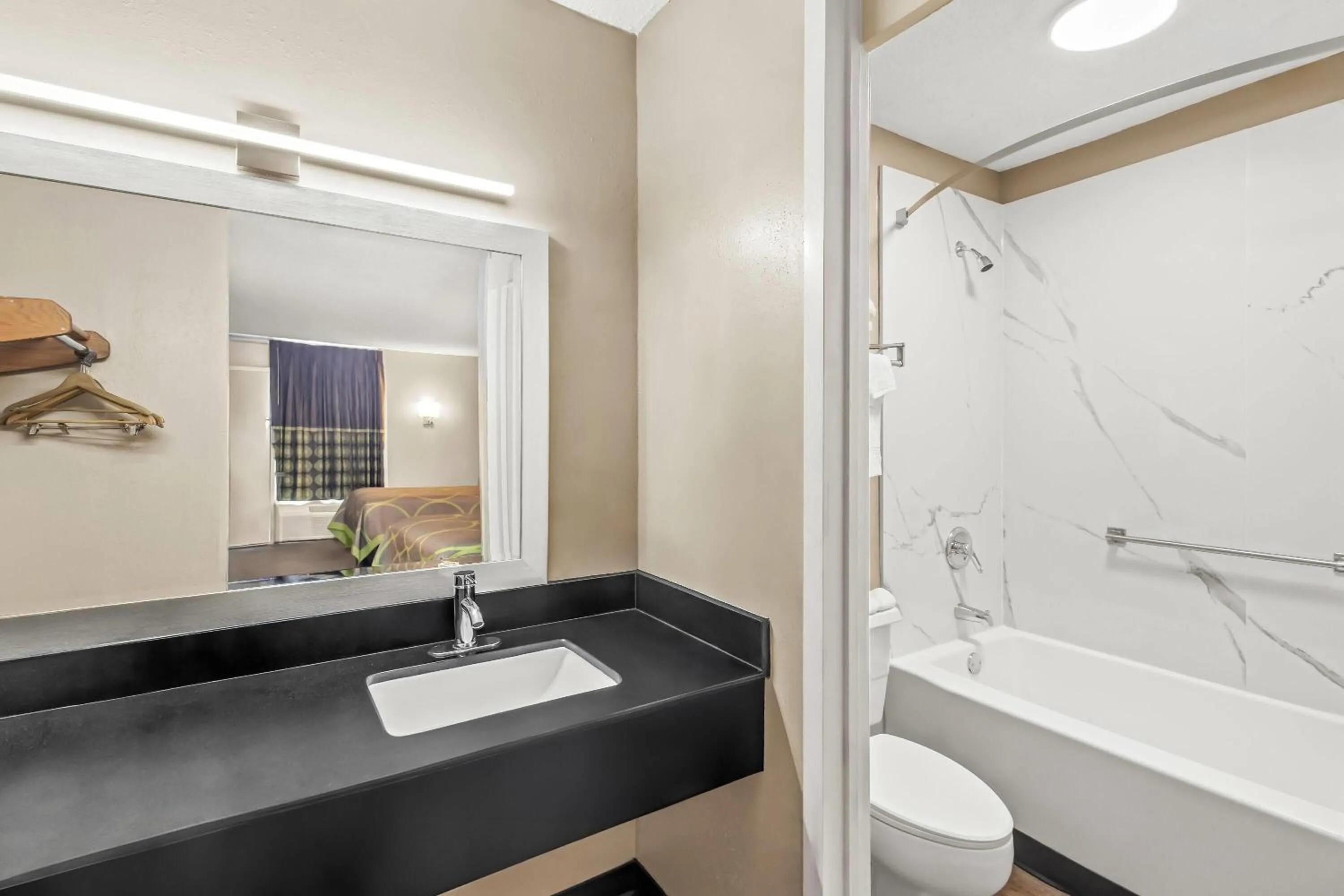 Bathroom in Super 8 by Wyndham Commerce