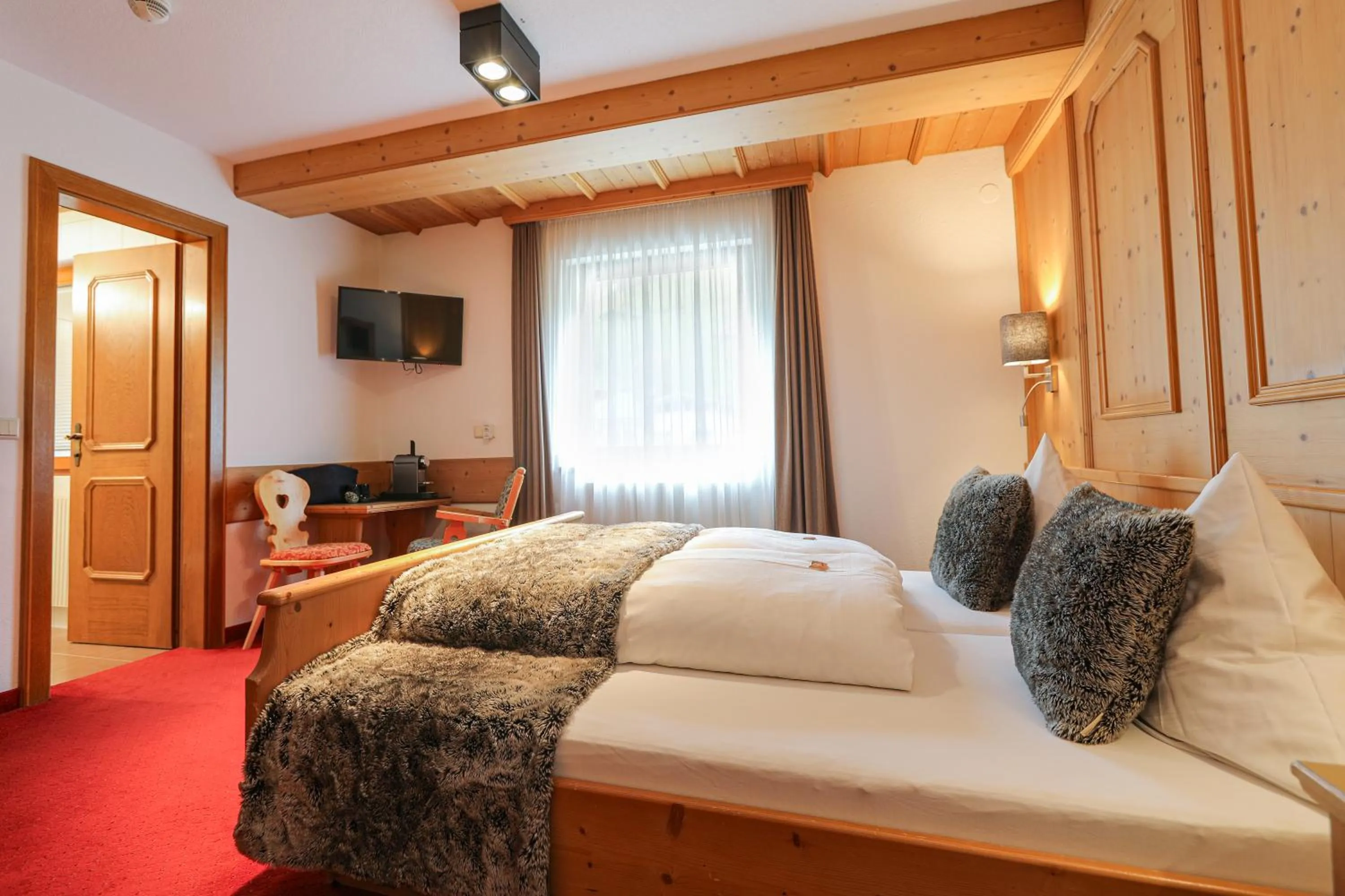 Bed in Chalet Madlein