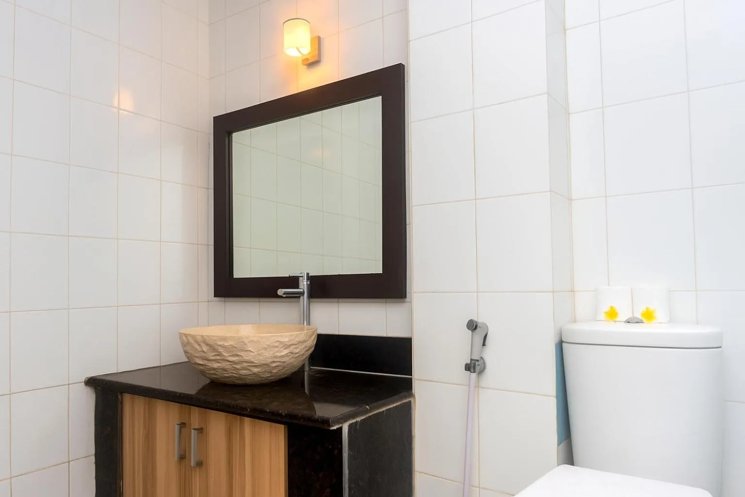 Bathroom in Puri Saron Denpasar Hotel