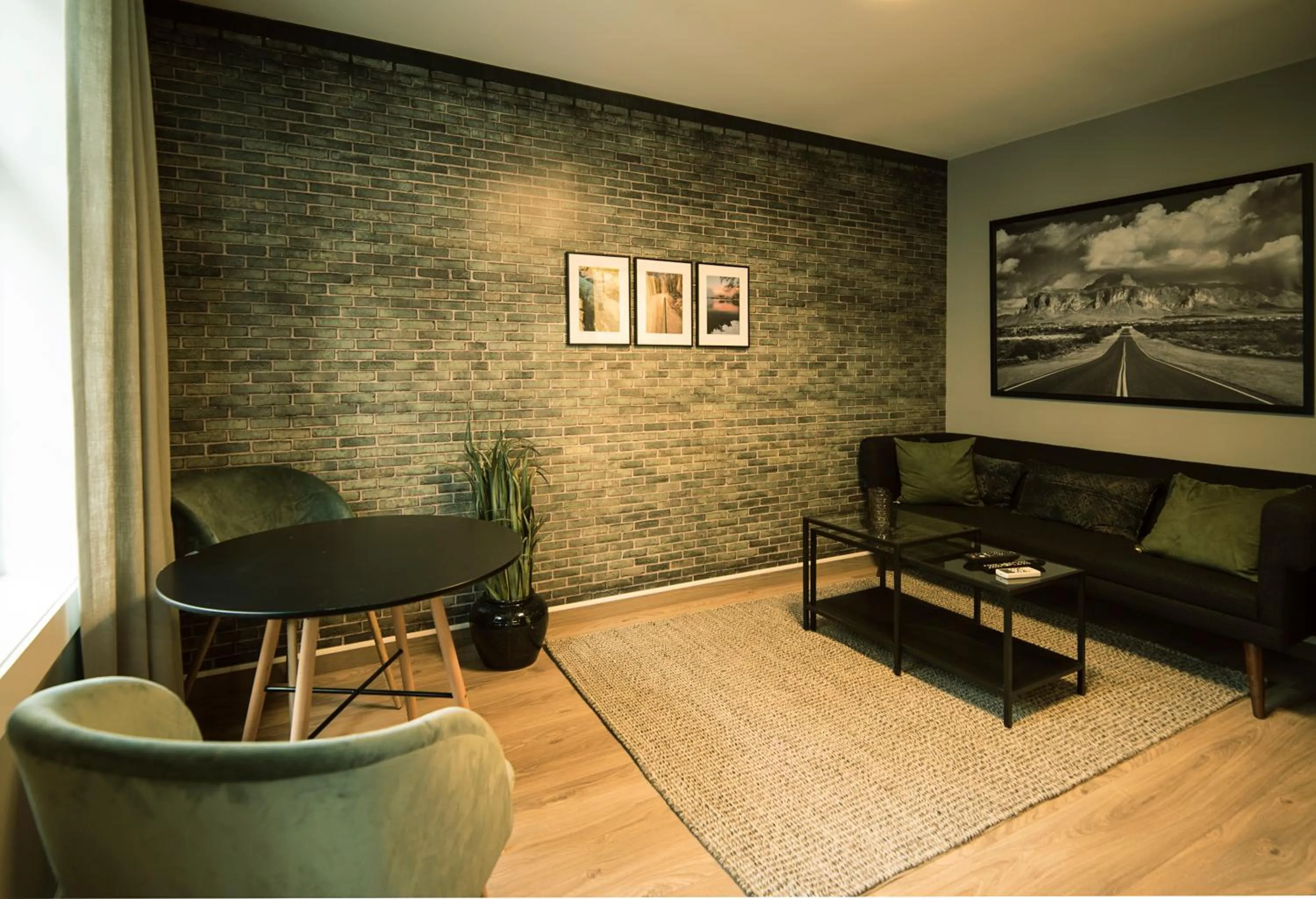 Living room in Home Again Apartments Nygata 1