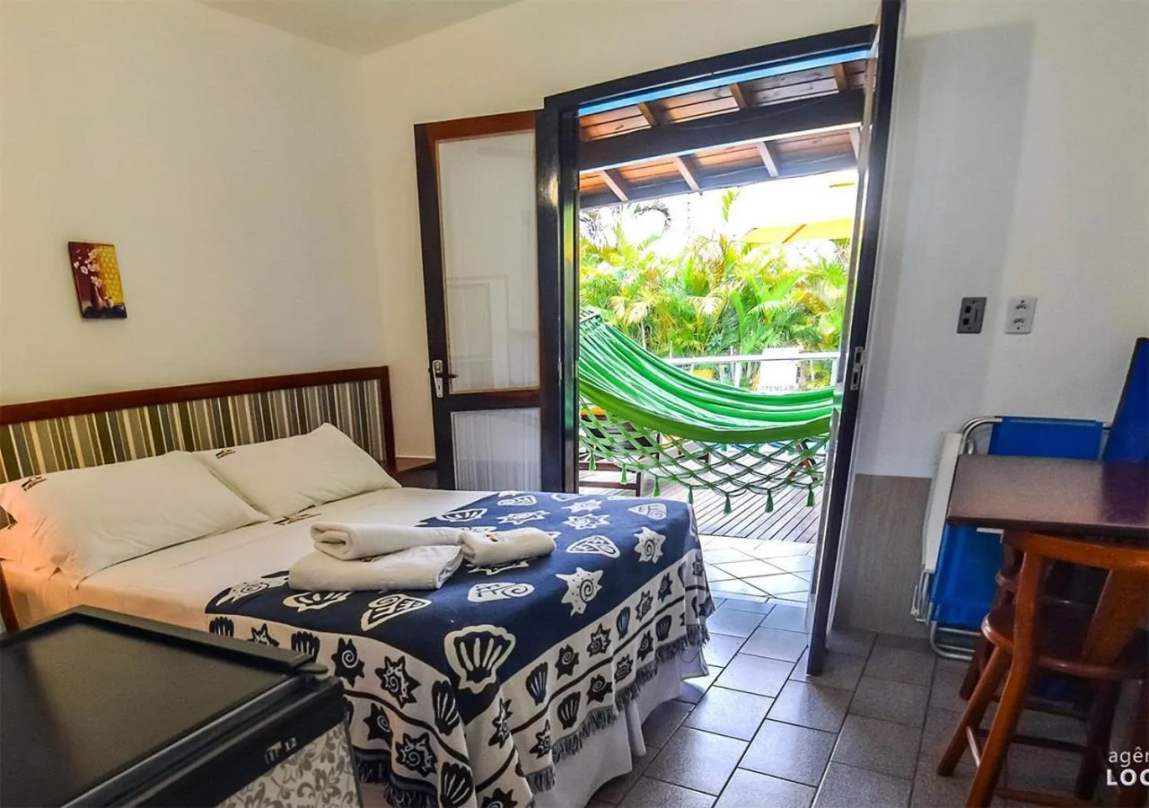 Photo of the whole room, Bed in Pousada Palhocinha Garopaba