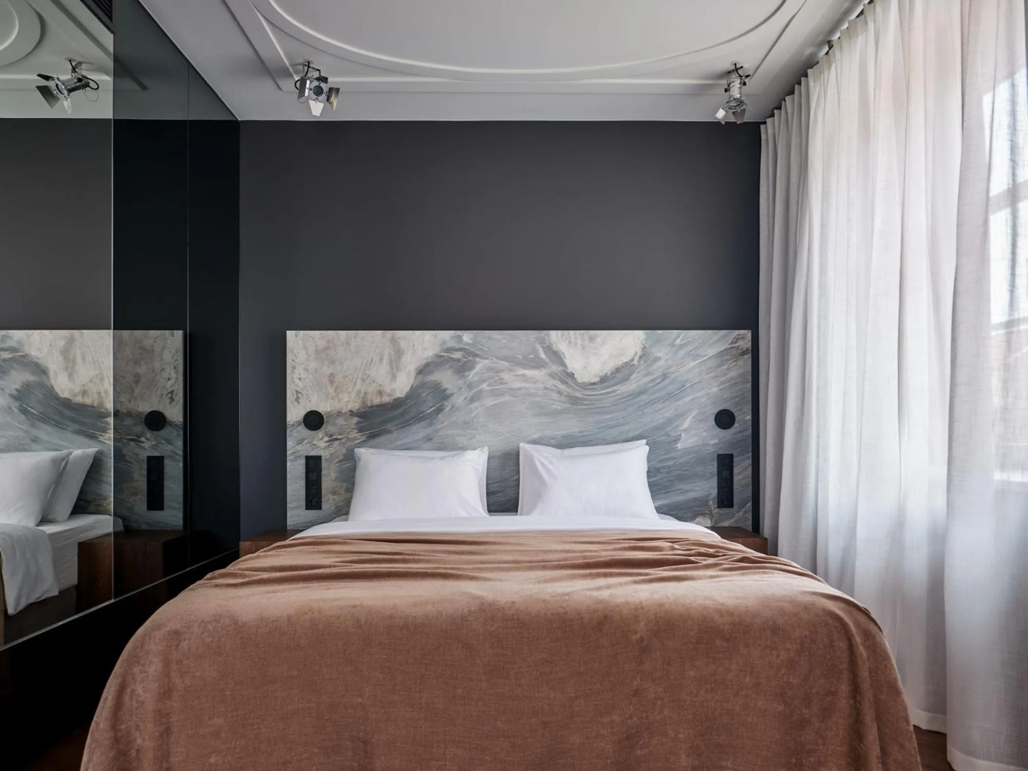 Bed in Hotel Reja, a Member of Design Hotels