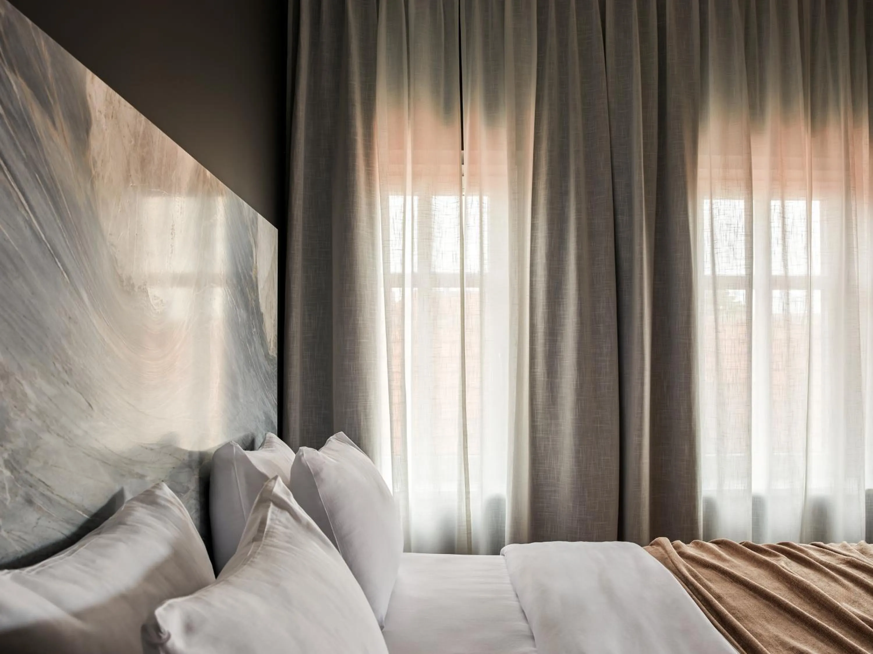 Bed in Hotel Reja, a Member of Design Hotels