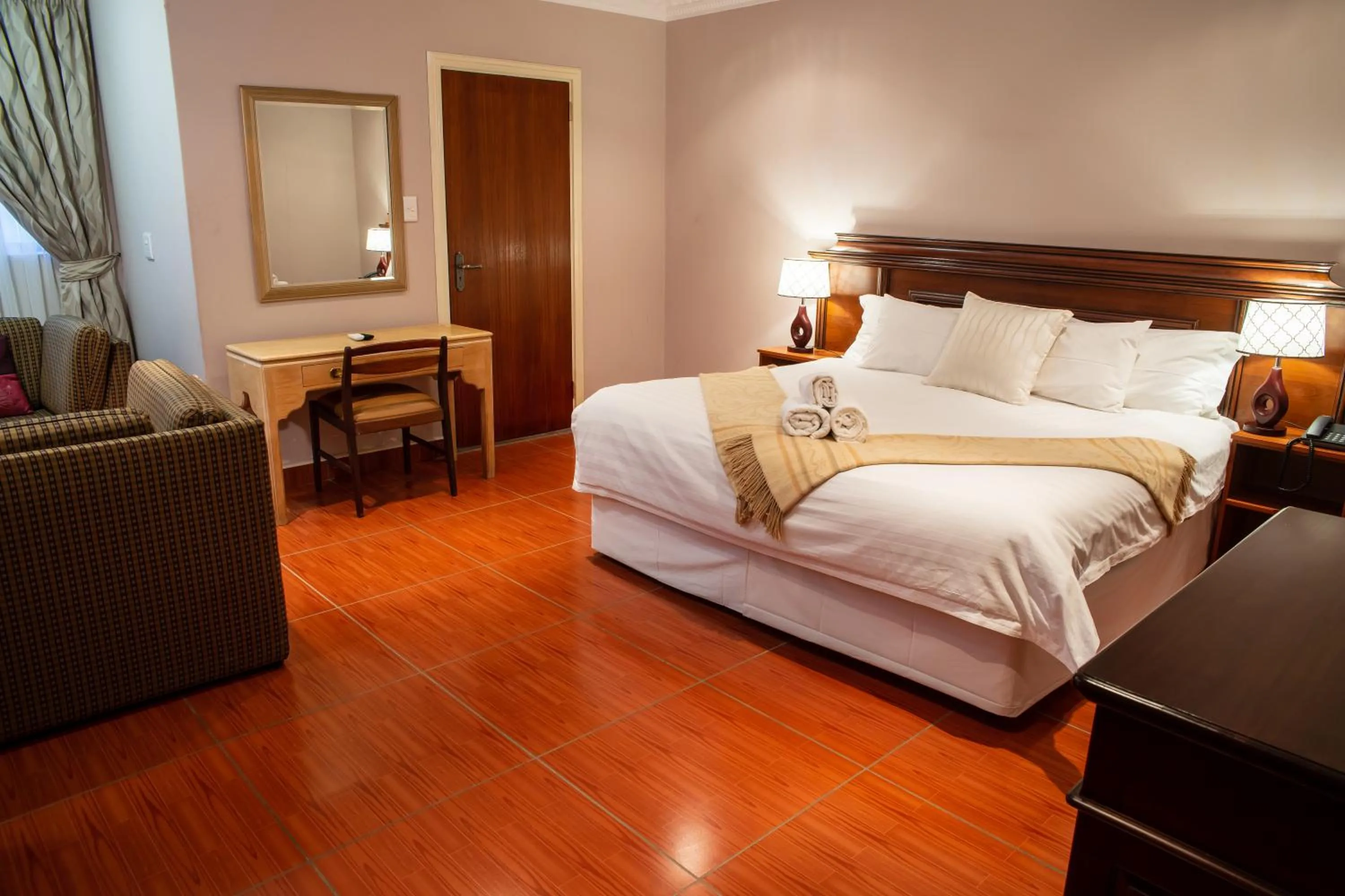 Photo of the whole room, Bed in Ngwenya Hotel & Conference Centre