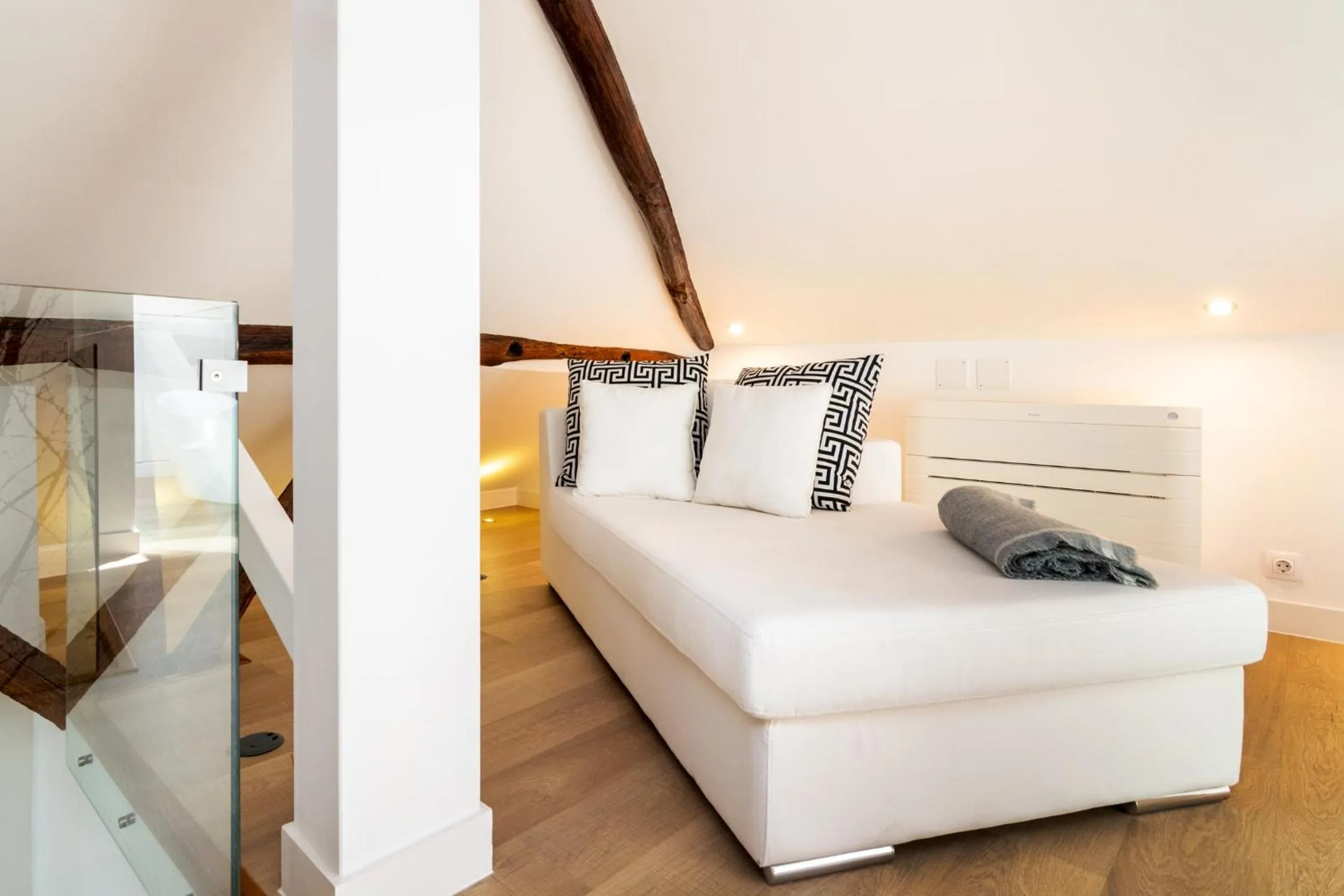 Seating area, Bed in WHome | Madalena Downtown Luxury Duplex