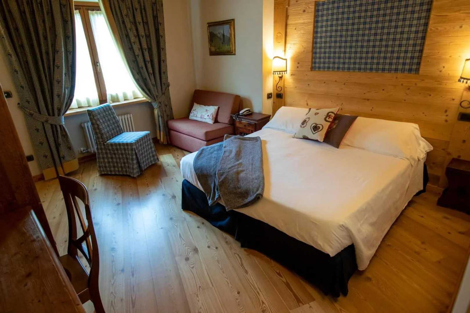 Bed in Laghetto Alpine Hotel & Restaurant