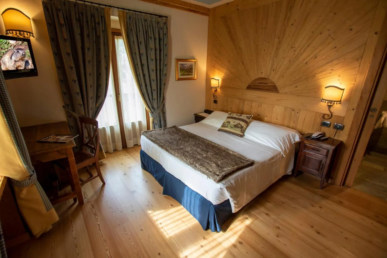Bed in Laghetto Alpine Hotel & Restaurant