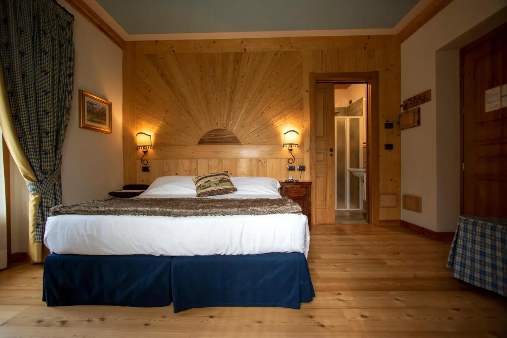 Bed in Laghetto Alpine Hotel & Restaurant