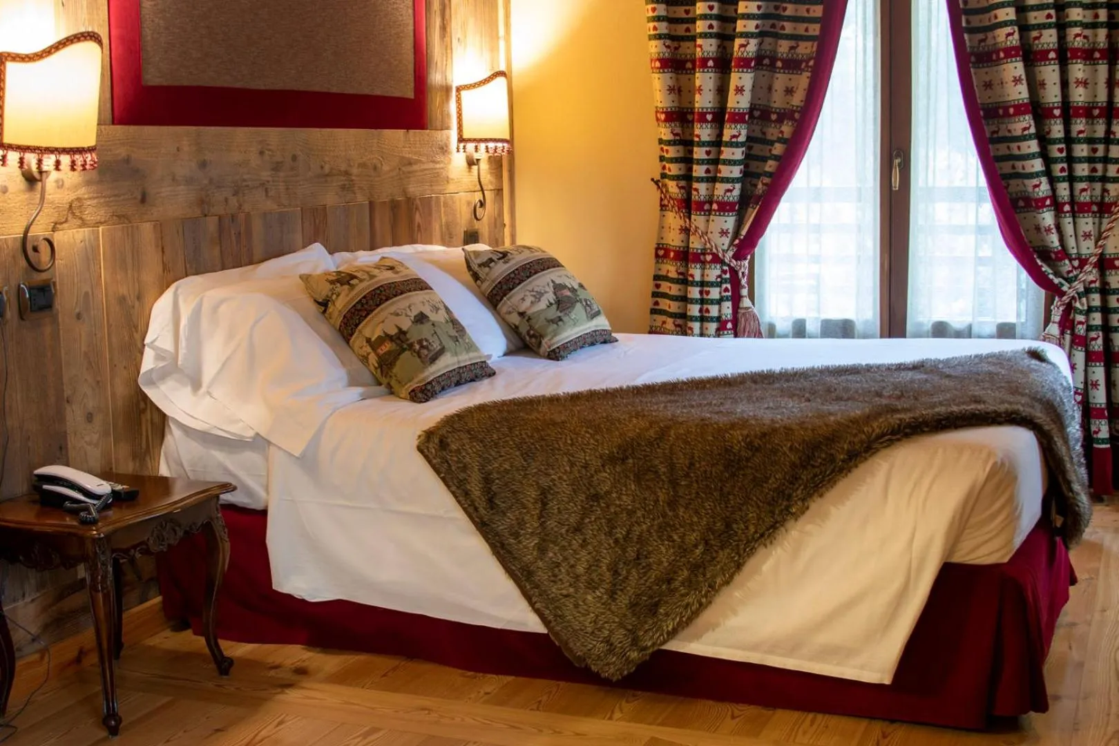 Bed in Laghetto Alpine Hotel & Restaurant