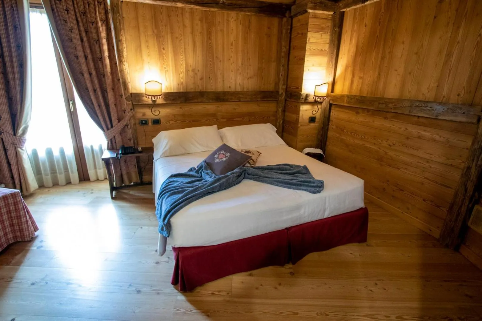 Bed in Laghetto Alpine Hotel & Restaurant