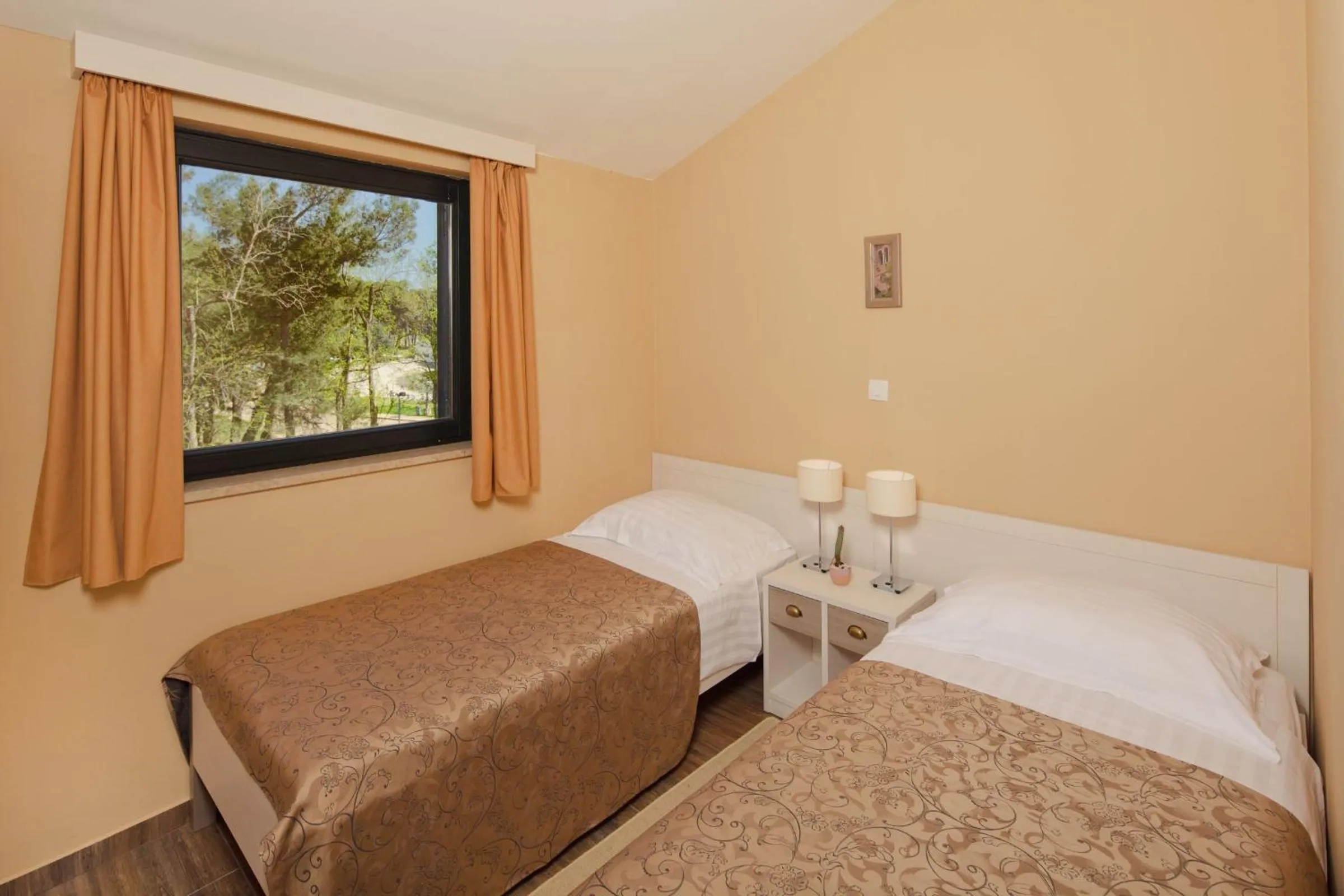 Bed in Apartments Amfora Plava Laguna