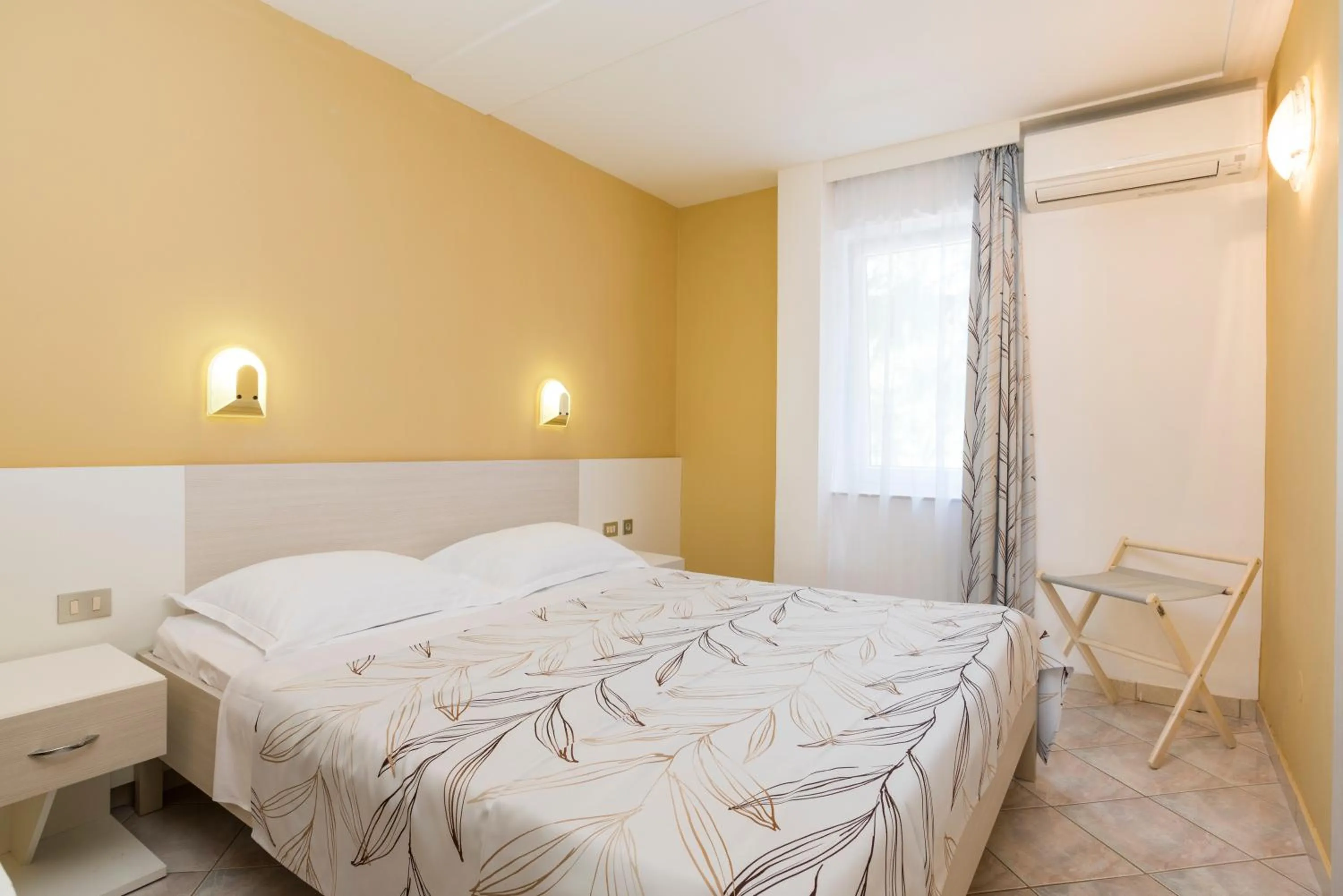 Bed in Apartments Amfora Plava Laguna