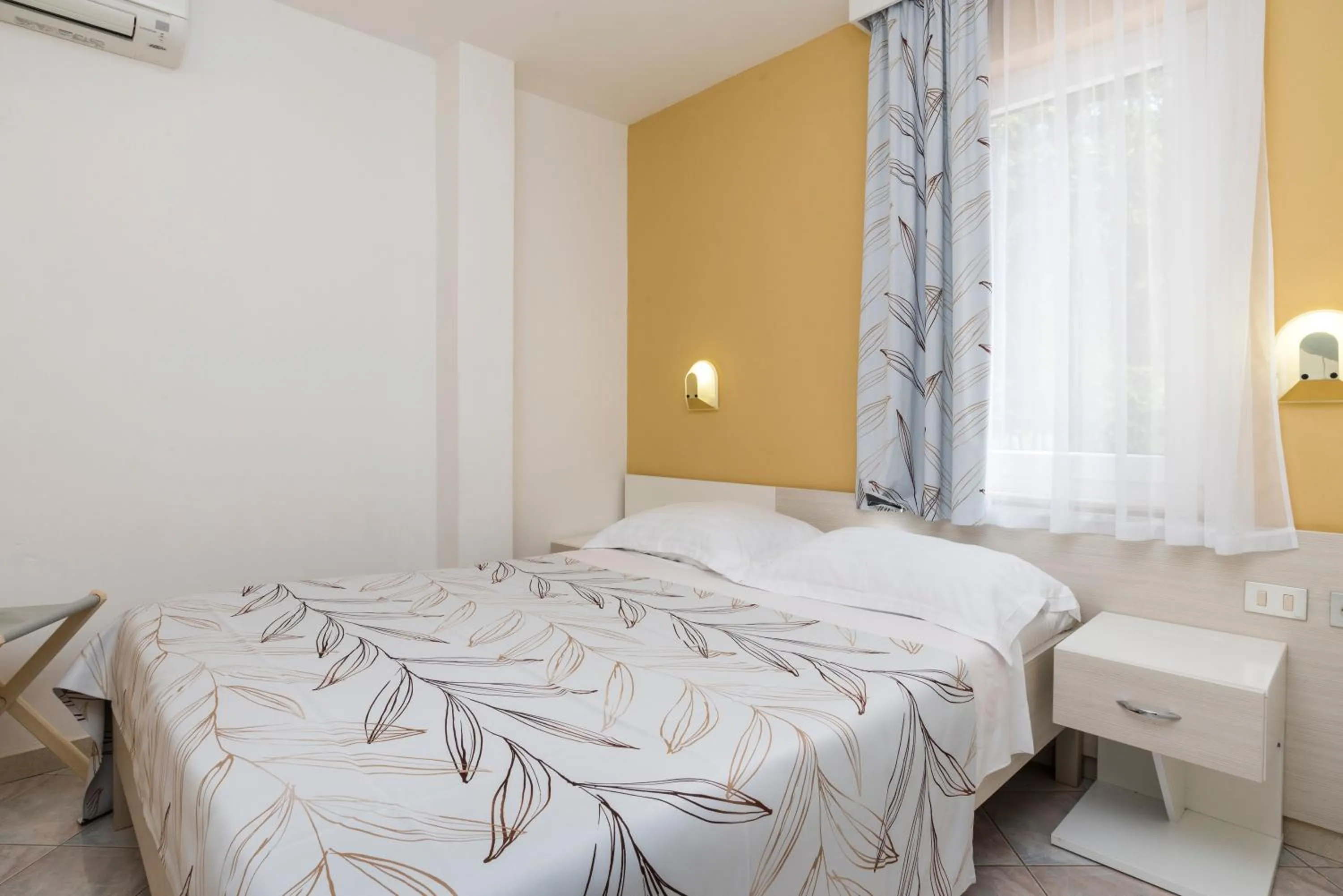 Bed in Apartments Amfora Plava Laguna