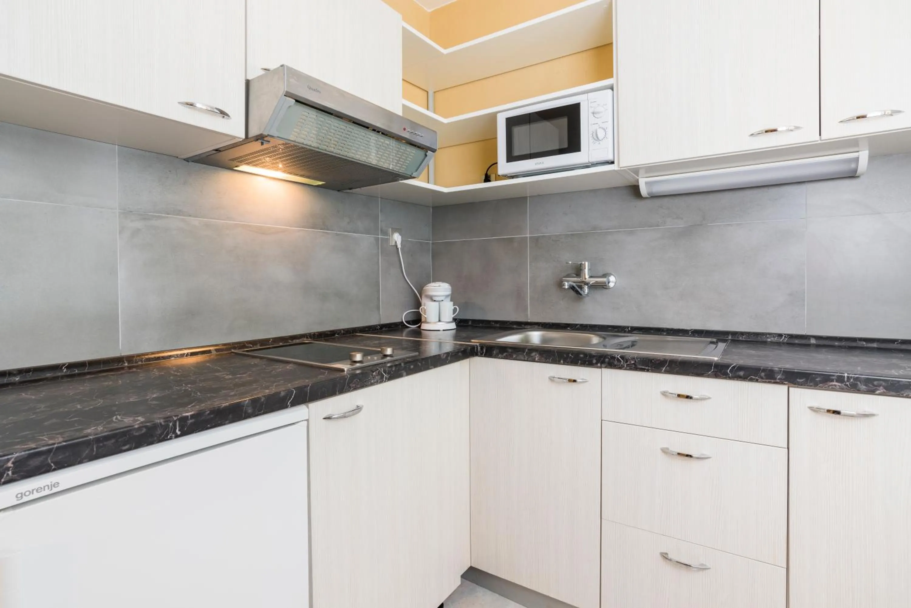 Kitchen or kitchenette in Apartments Amfora Plava Laguna