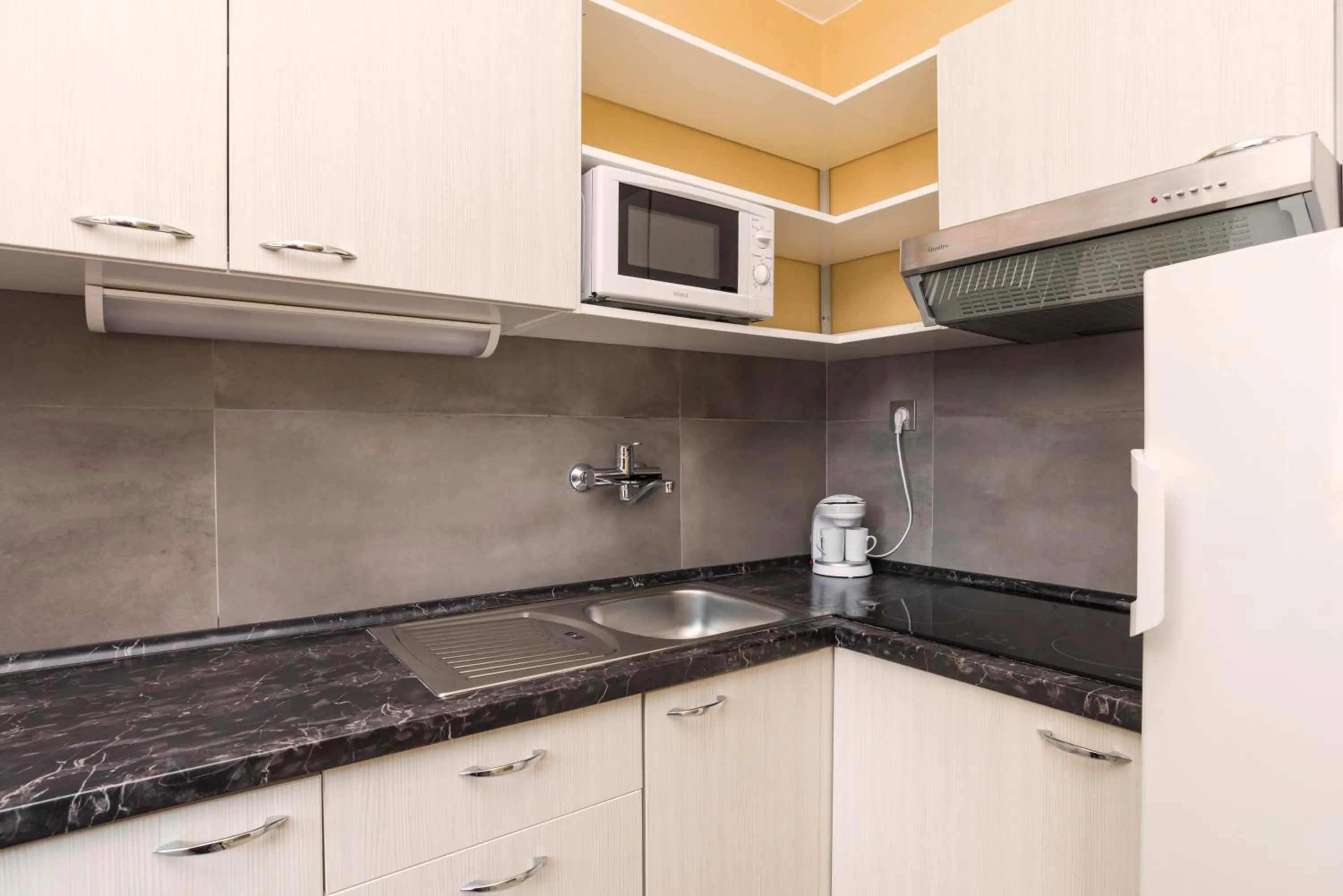 Kitchen or kitchenette in Apartments Amfora Plava Laguna