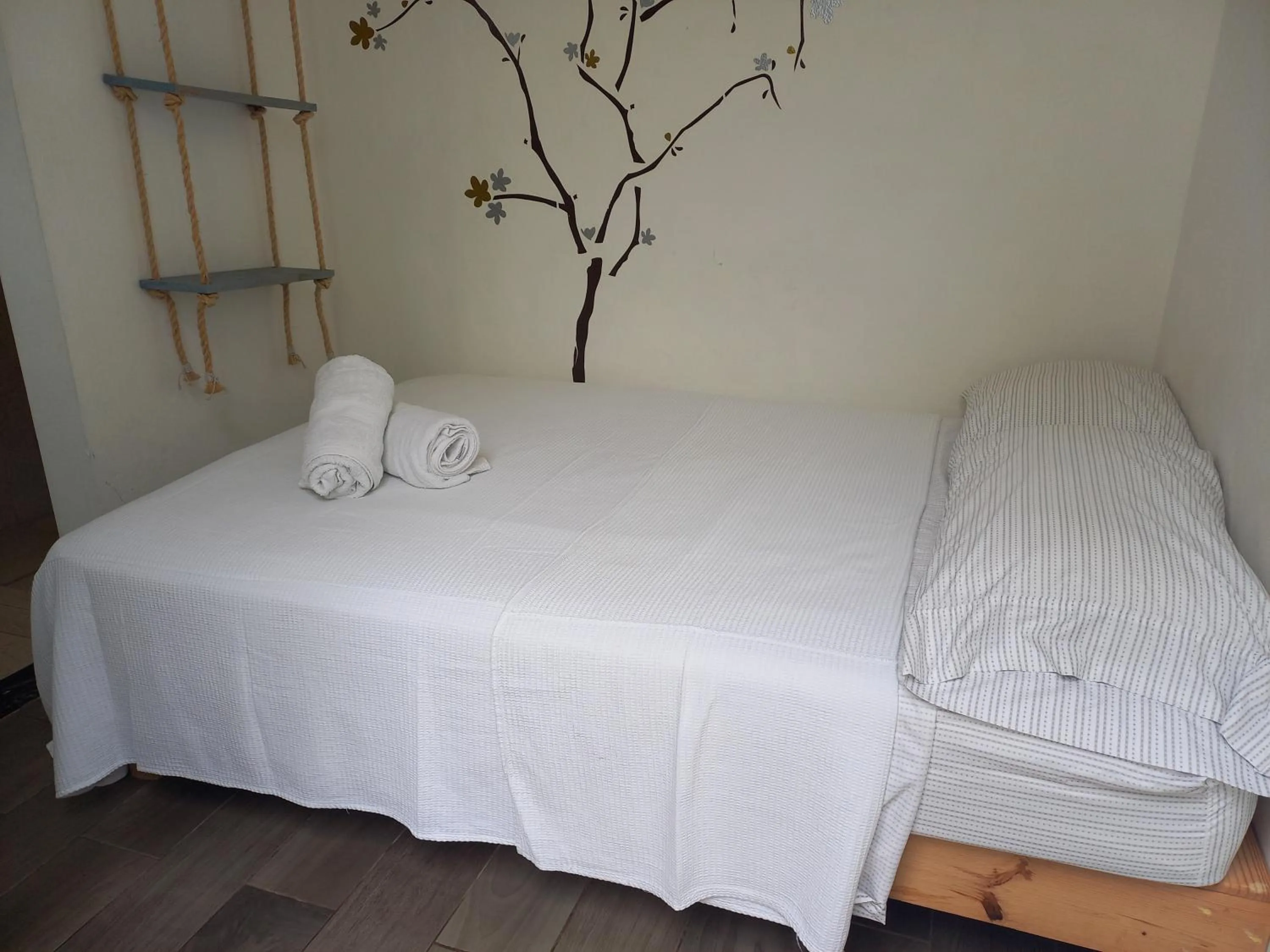 Bed in AMAXING Cancun Airport