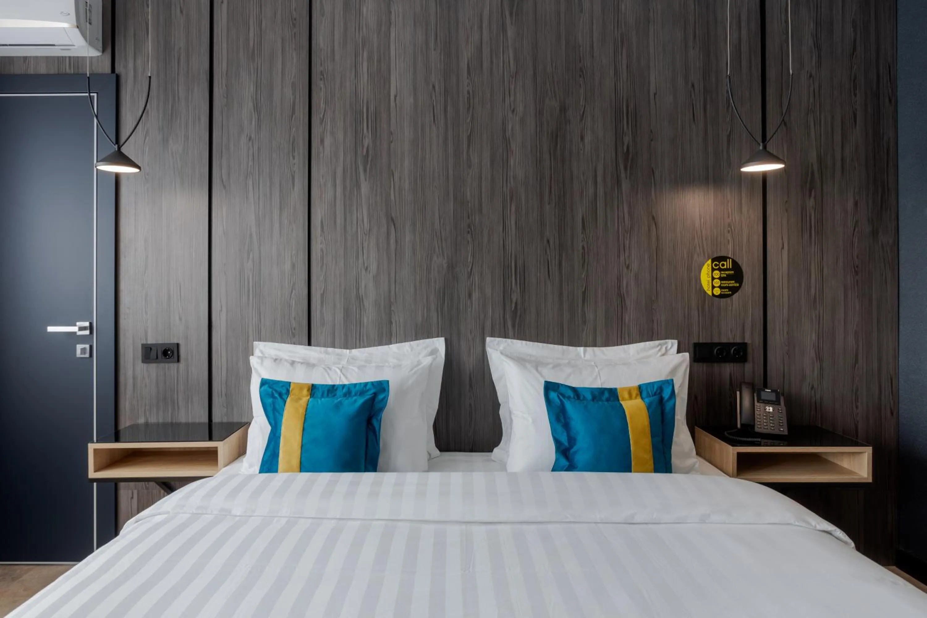 Bed in Tulip Residence & Spa Hotel