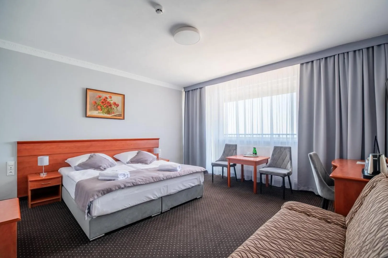 Bed in Hotel Wodnik Twój Hotel z widokiem na morze