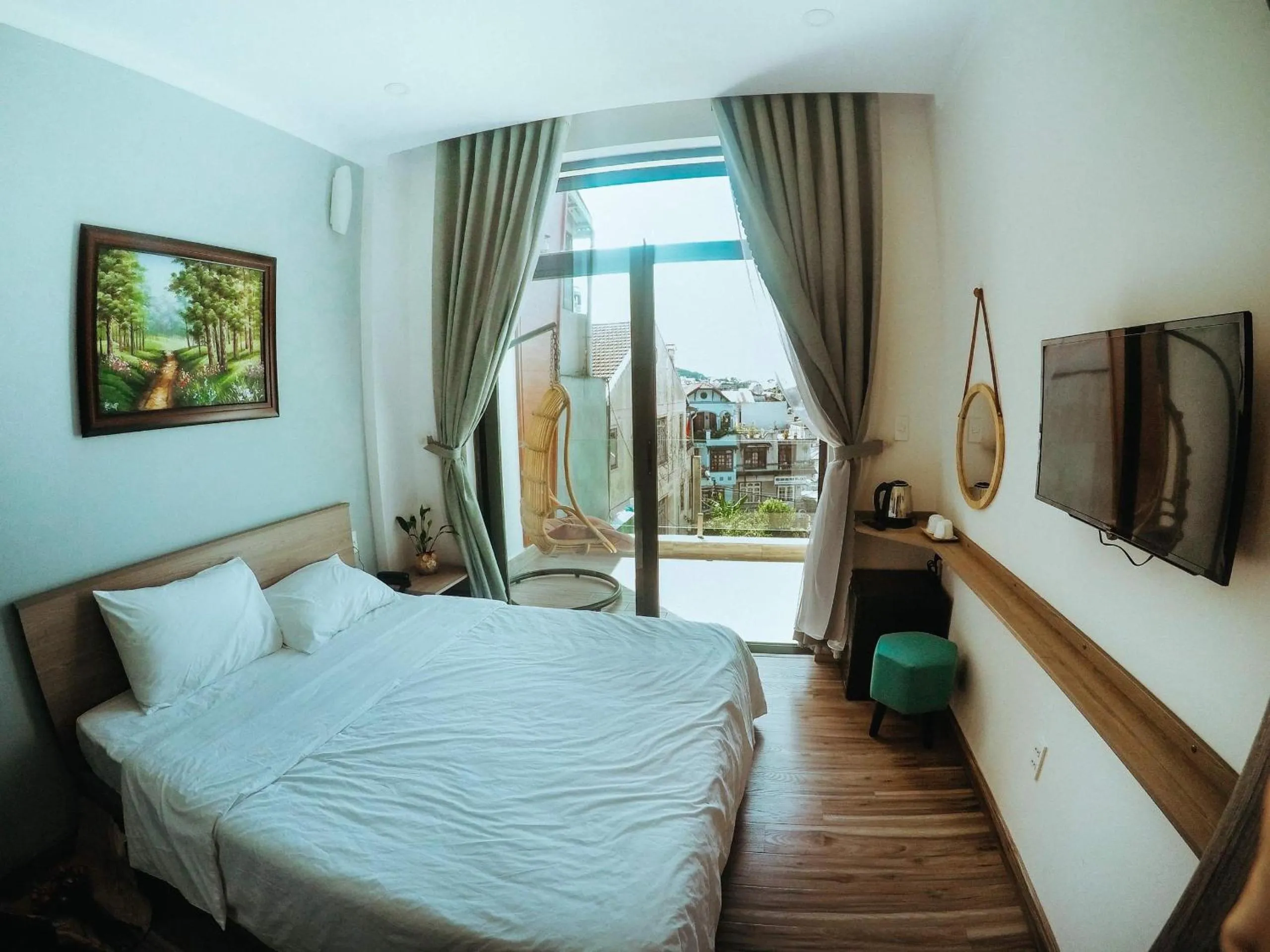 Communal lounge/ TV room, Bed in Dalat Memory Inn