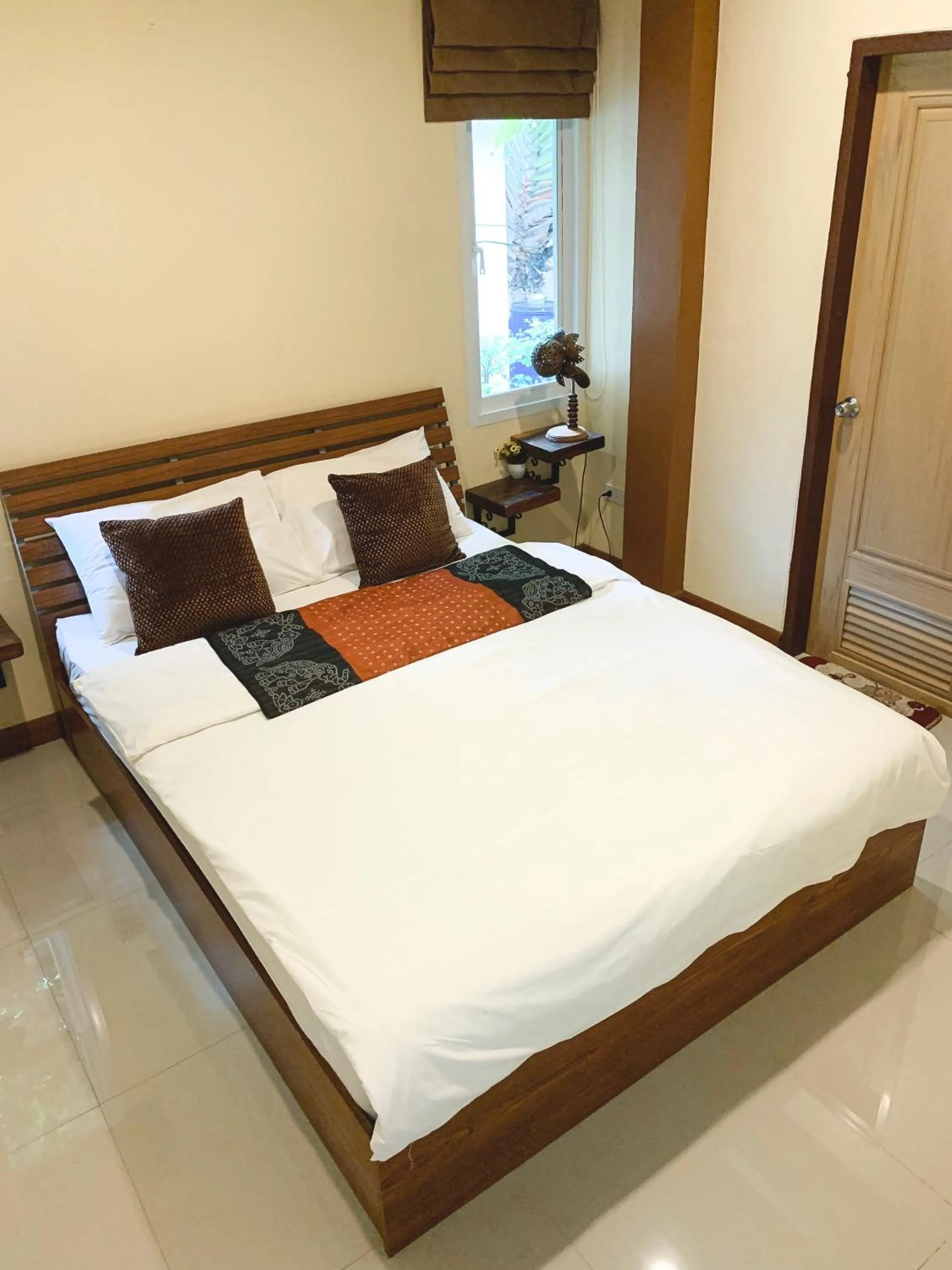 Bed in Baan Sooksiri Bangsaray