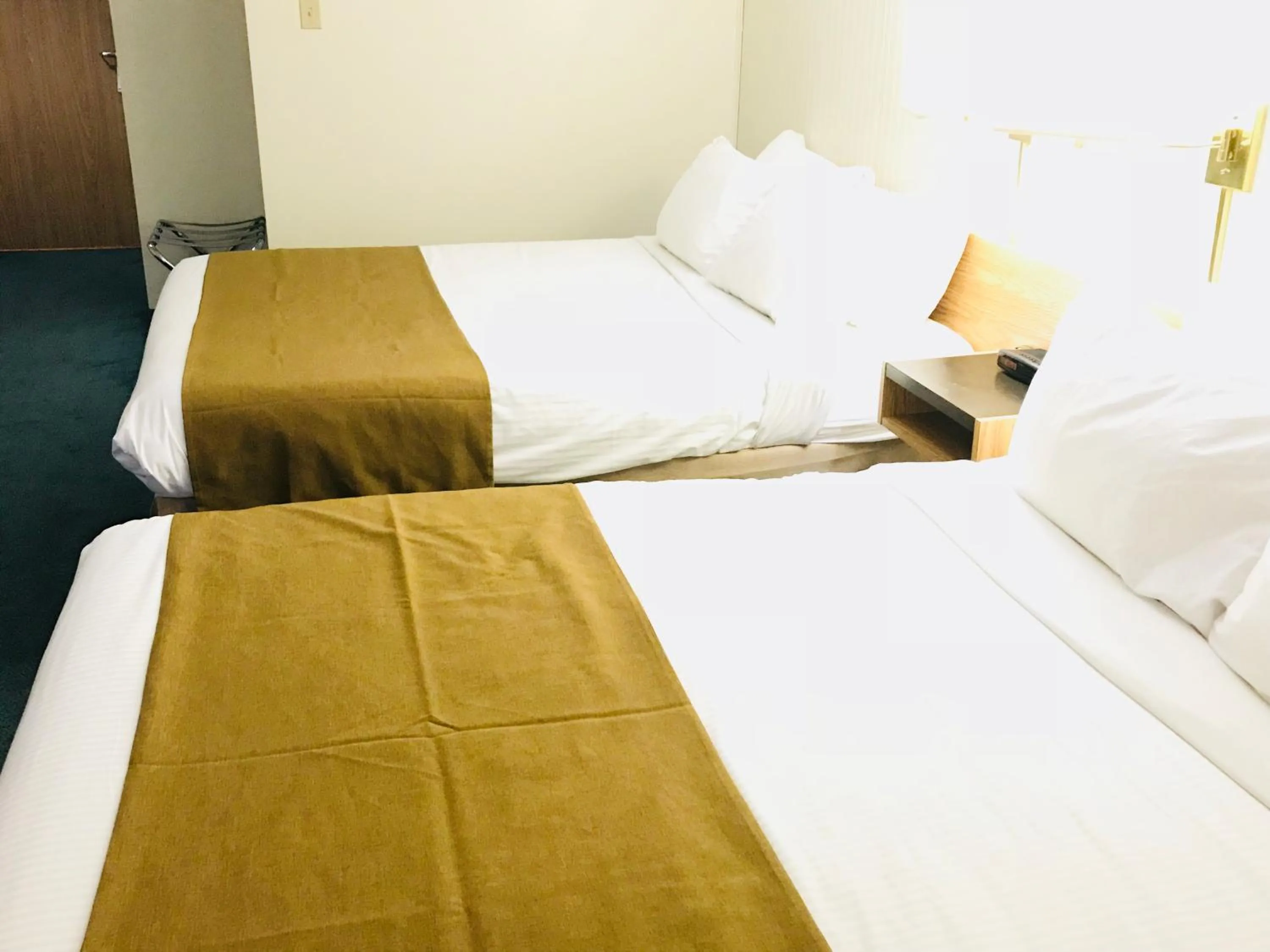 Bed in Northern Star Hotel & Convention Center