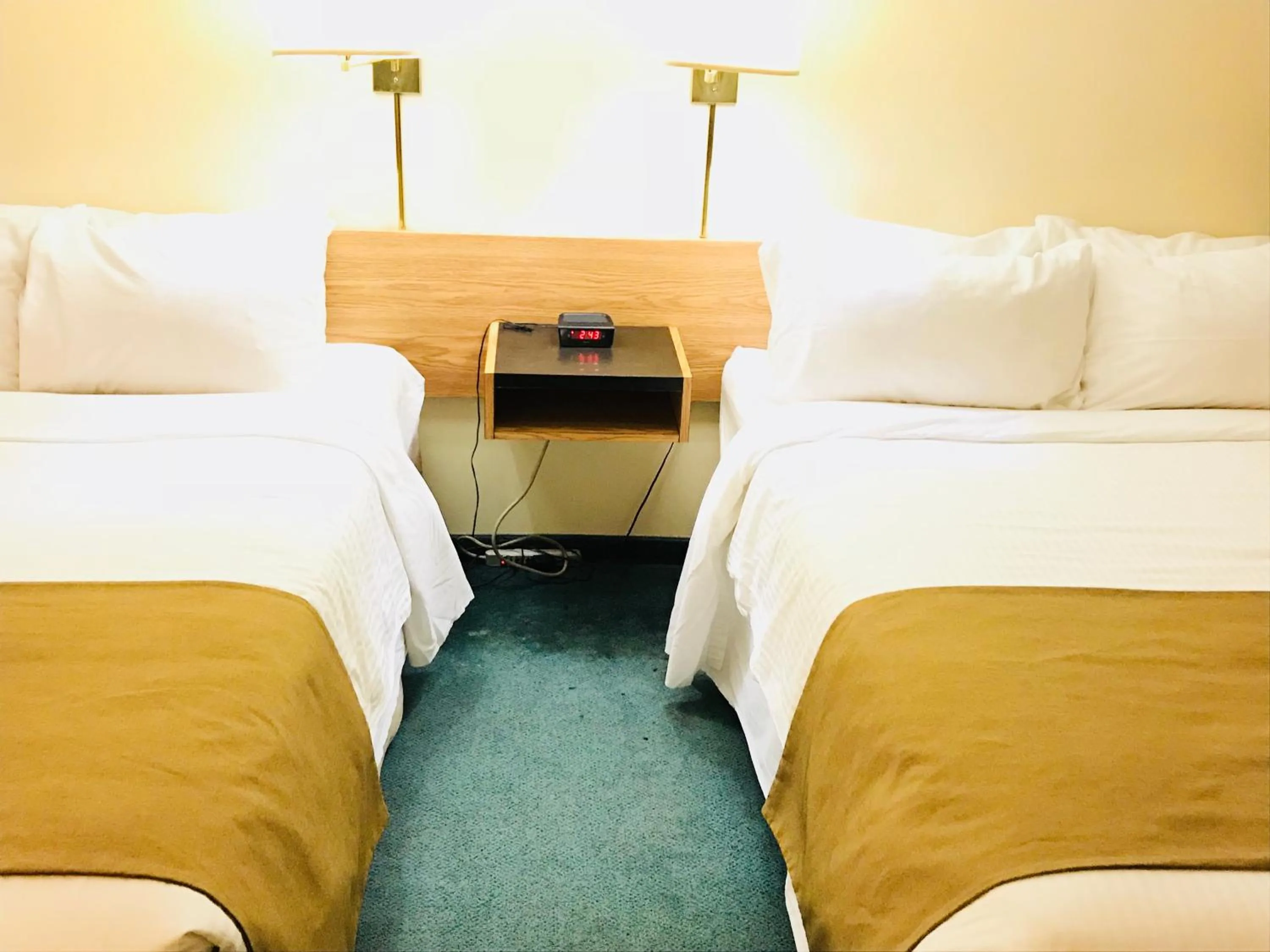 Bed in Northern Star Hotel & Convention Center