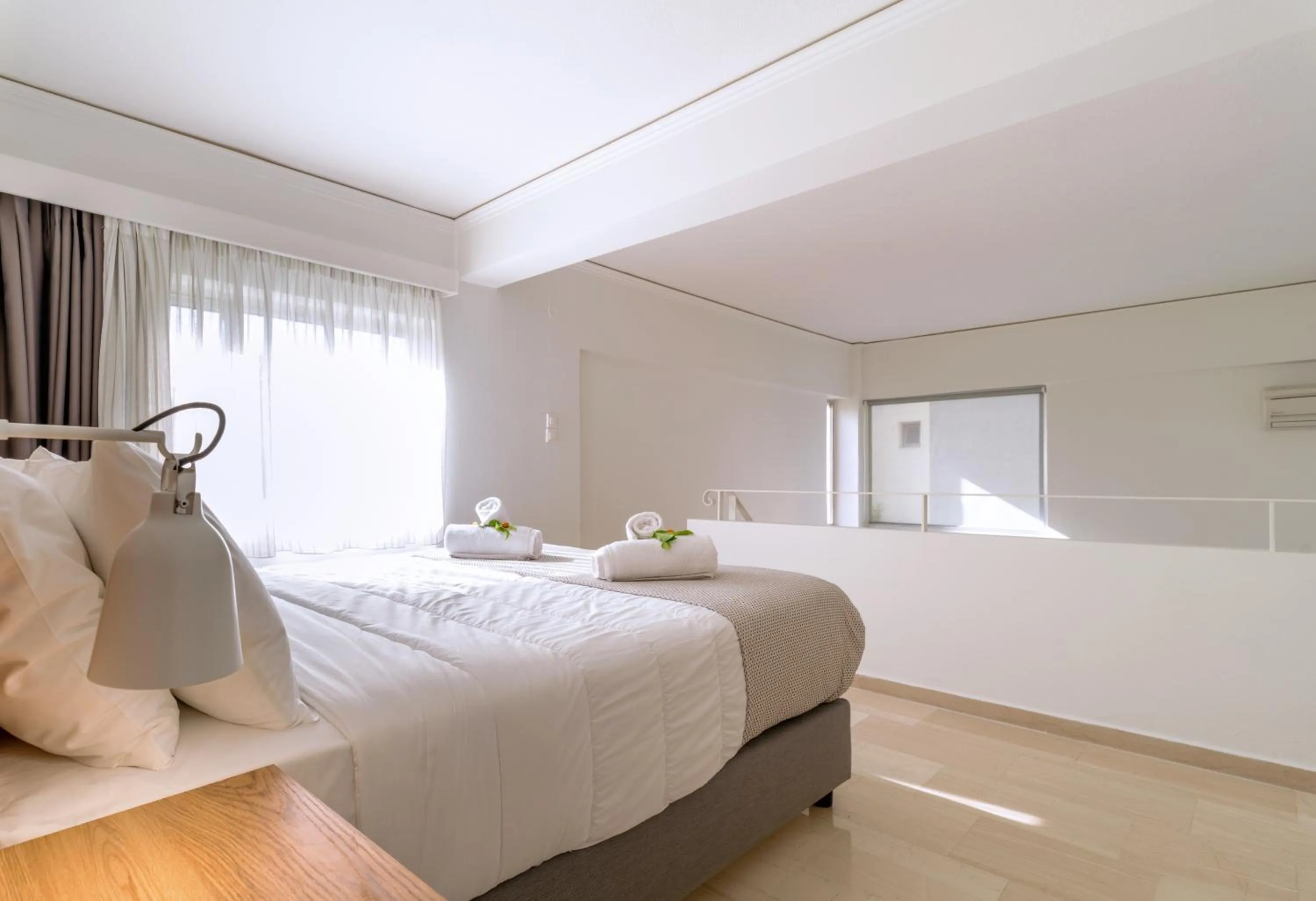 Bed in Lotus Hotel Apartments