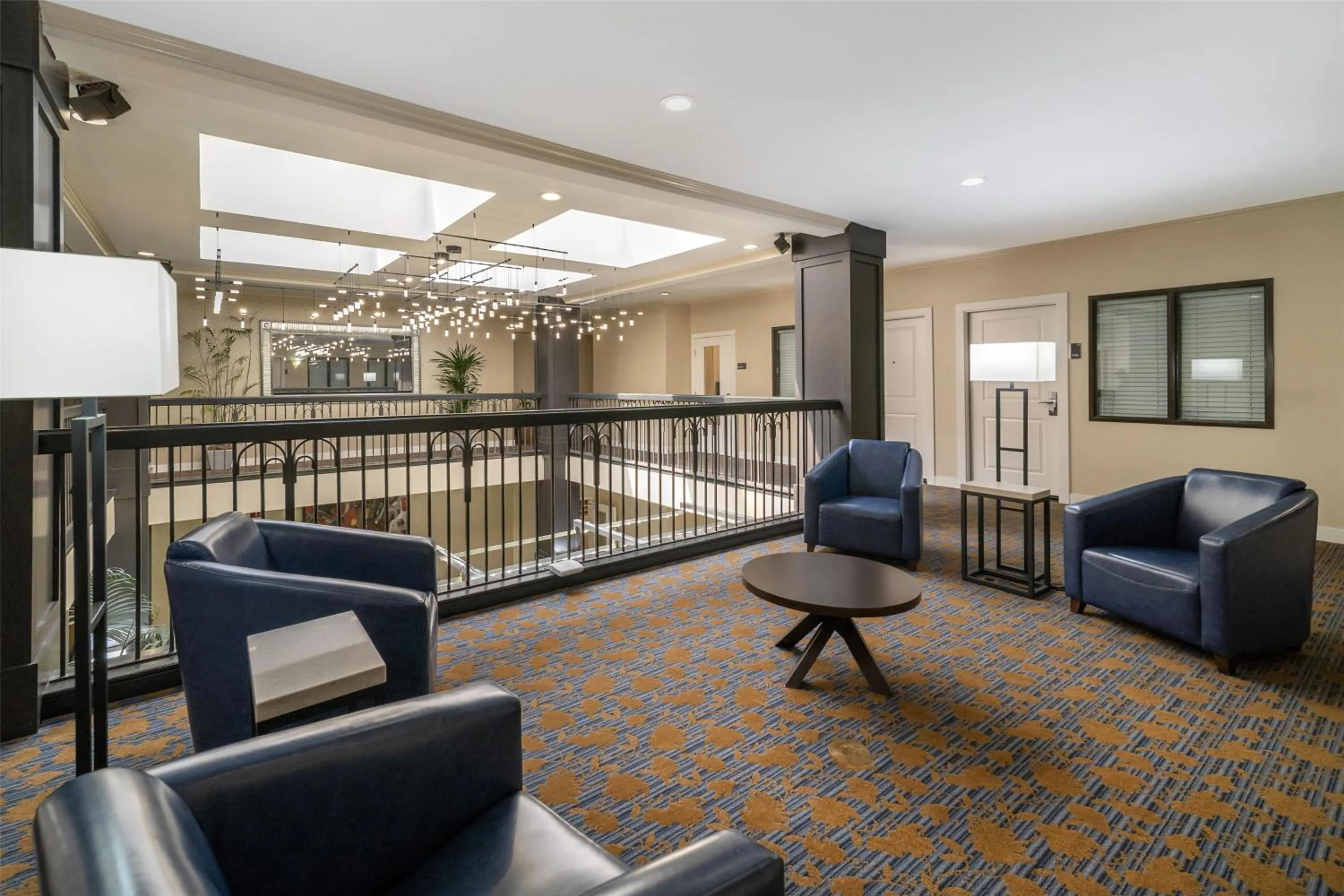 Lobby or reception in Best Western Plus Palm Court Hotel