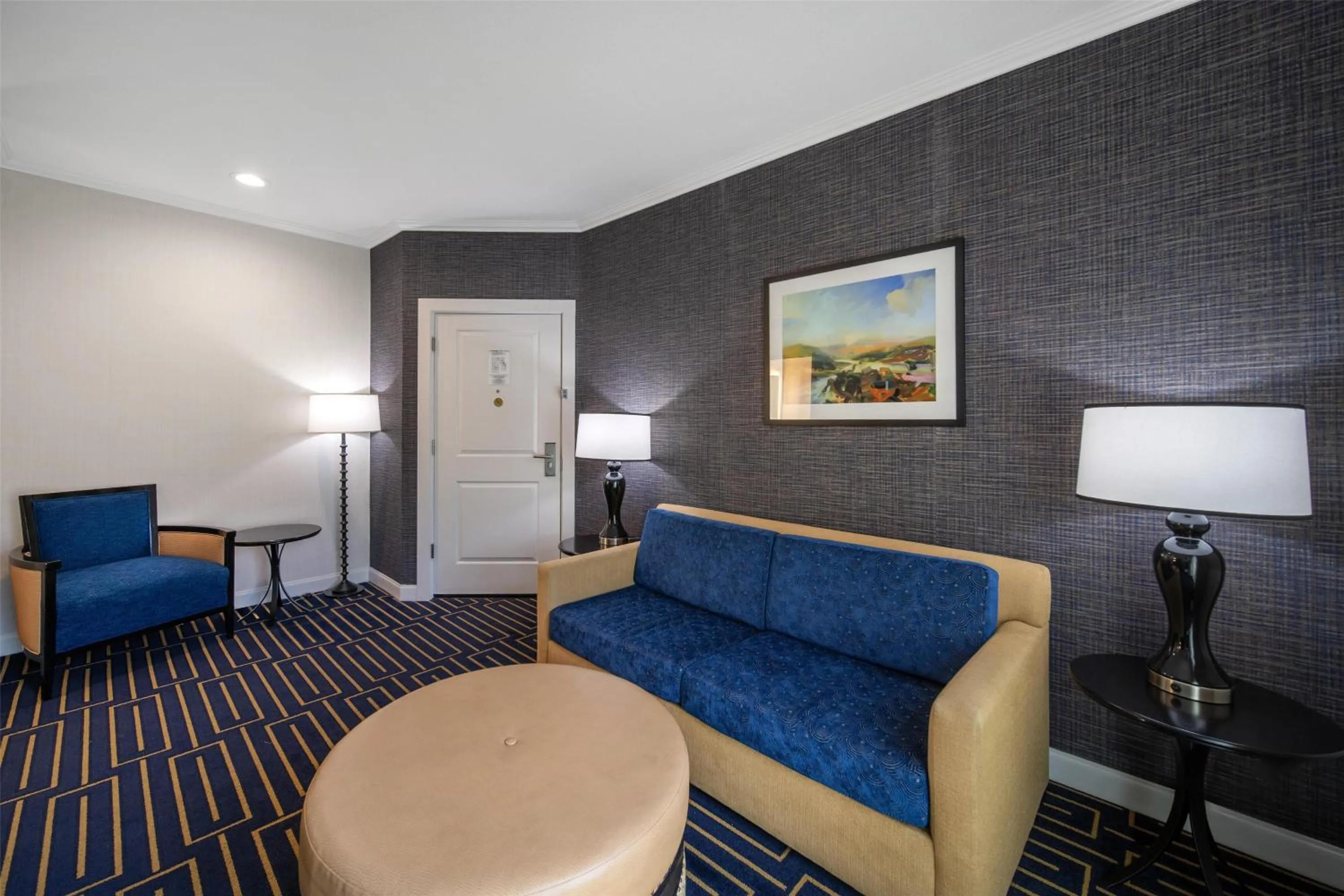 Bedroom in Best Western Plus Palm Court Hotel