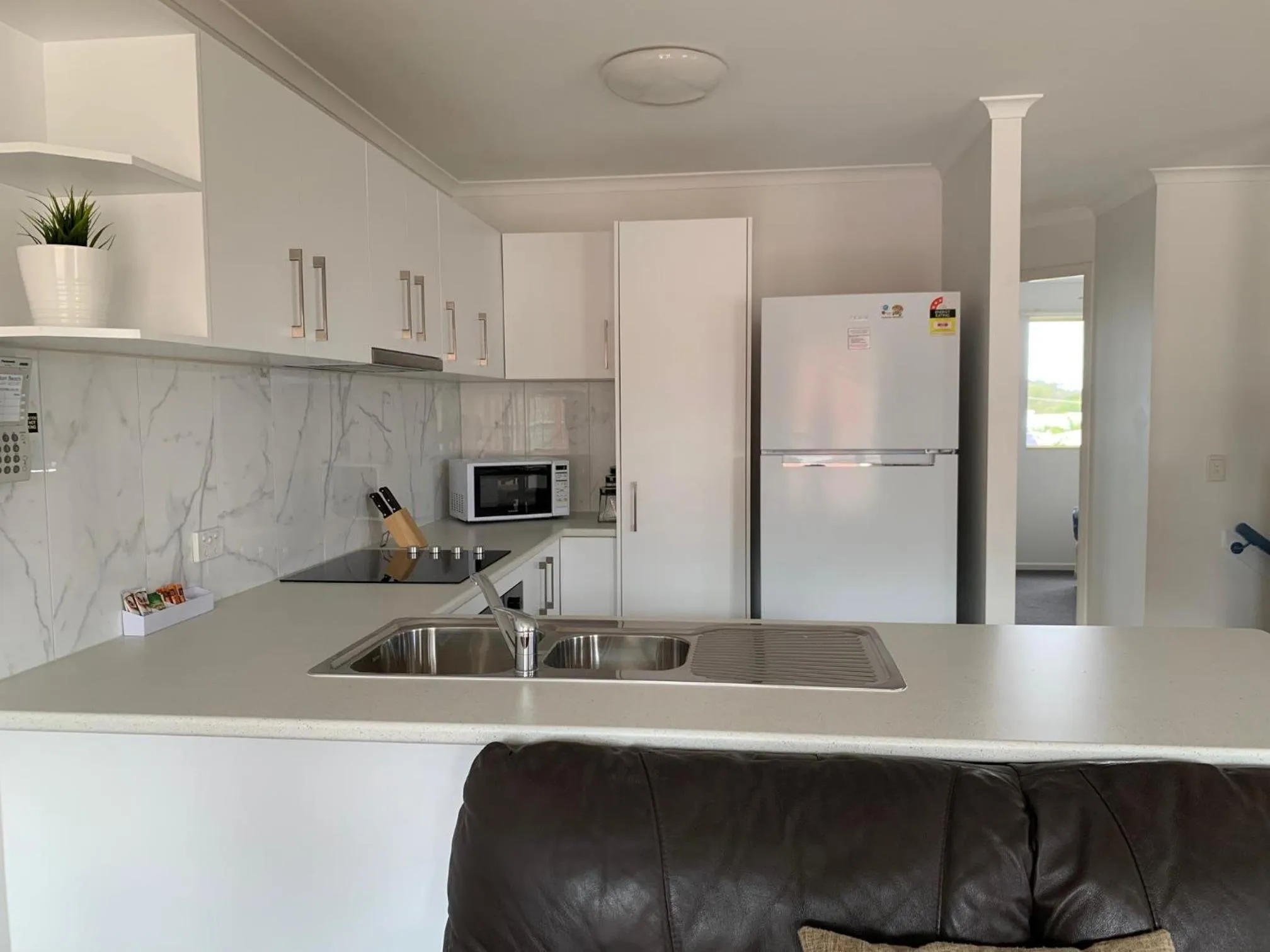 Kitchen or kitchenette in Coolum Beach Getaway Resort