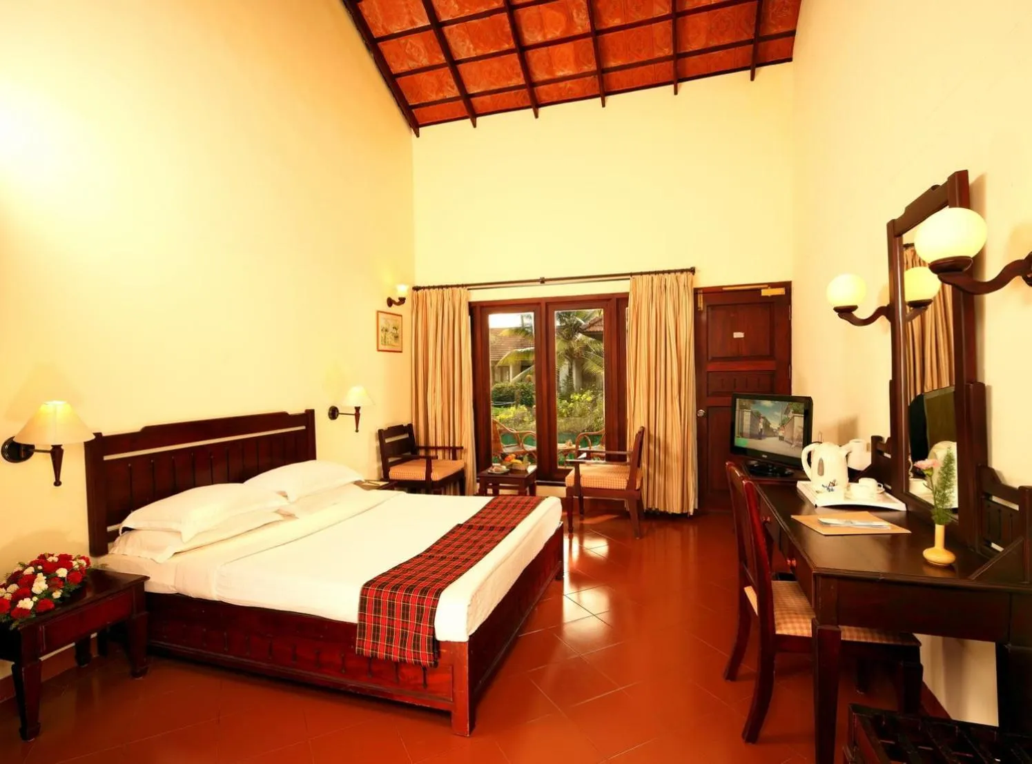 Photo of the whole room, Bed in Abad Whispering Palms