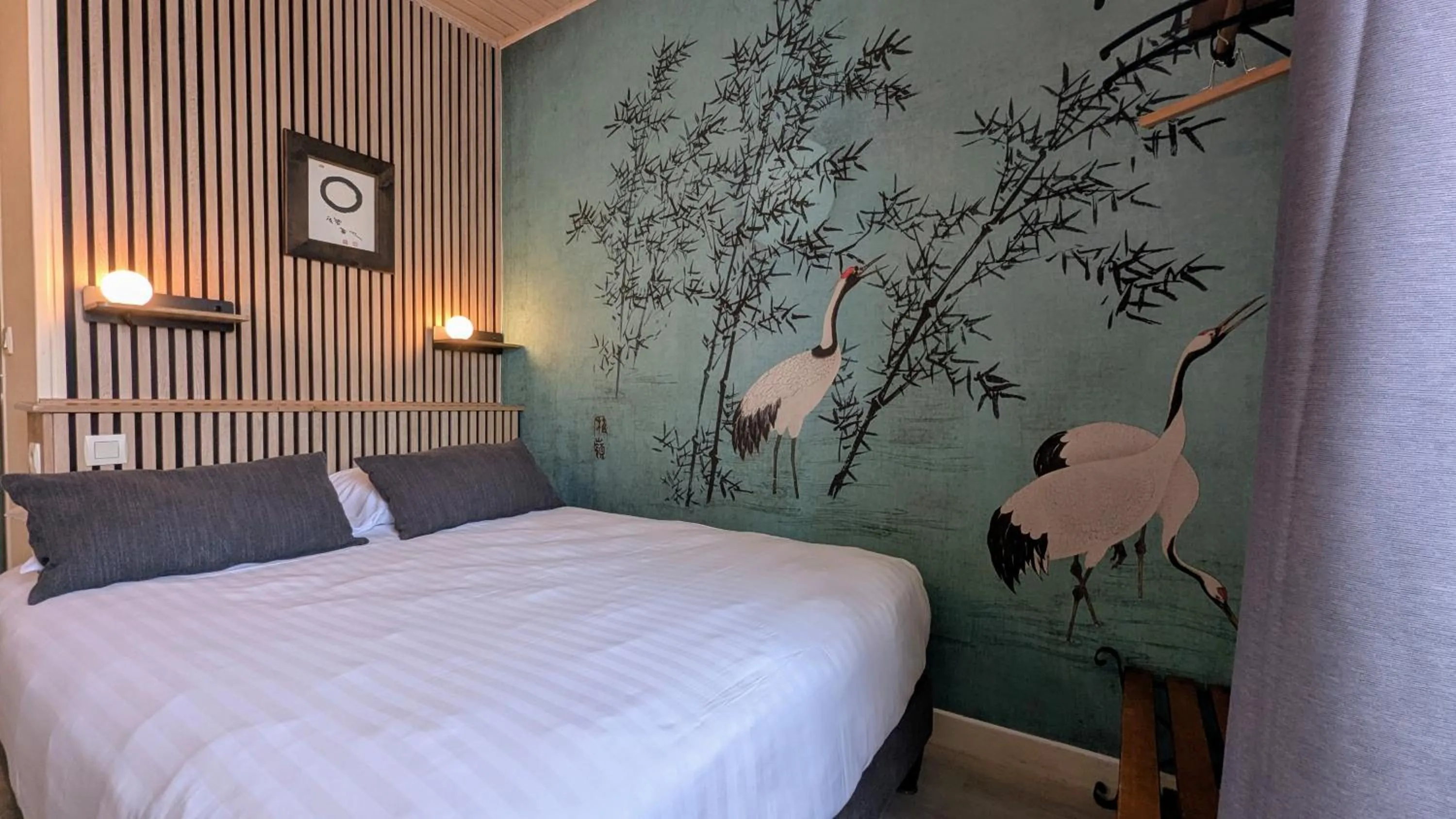 Bed in Logis Hôtel Lafayette Rochefort France