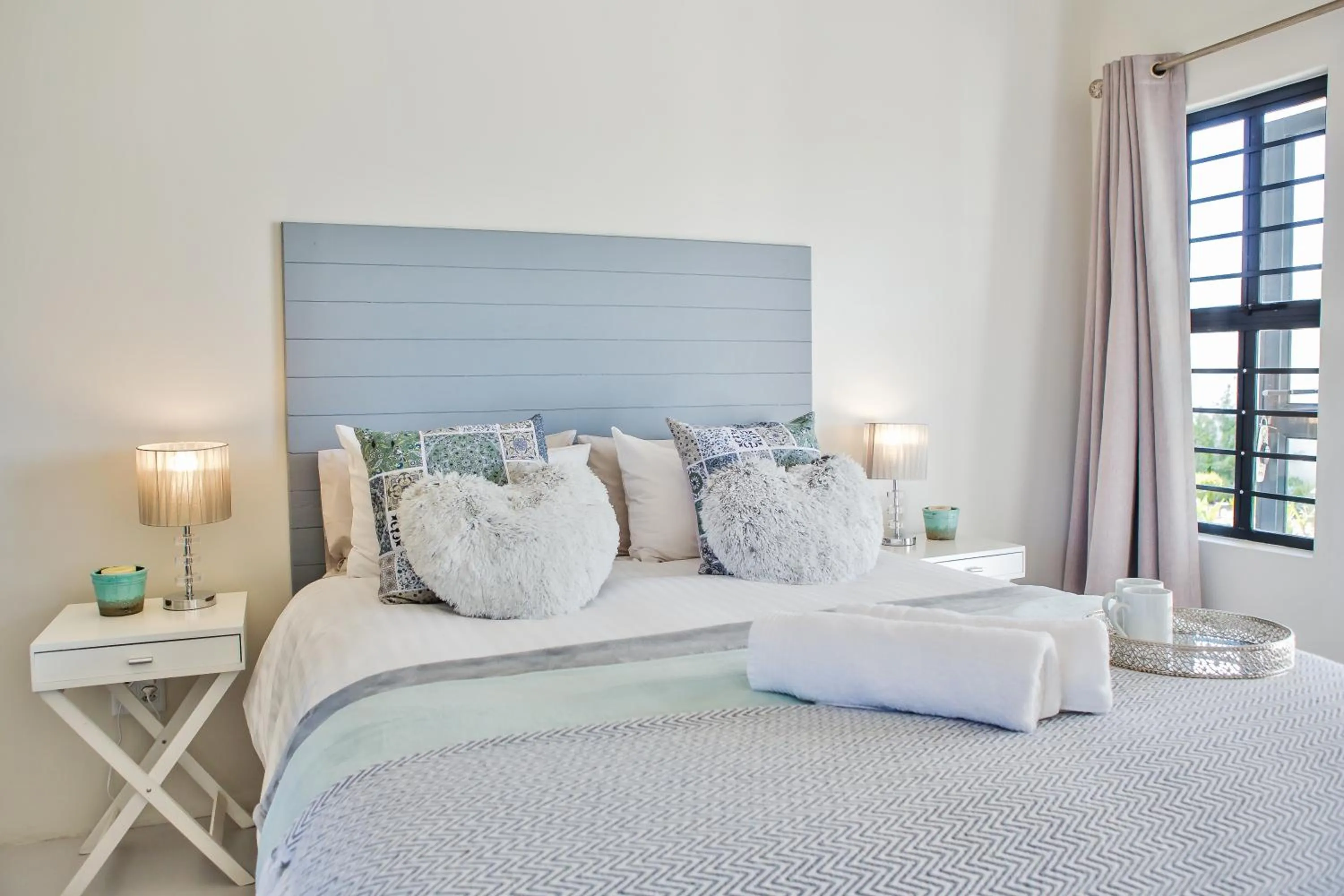 Bed in Three Feathers Cottages