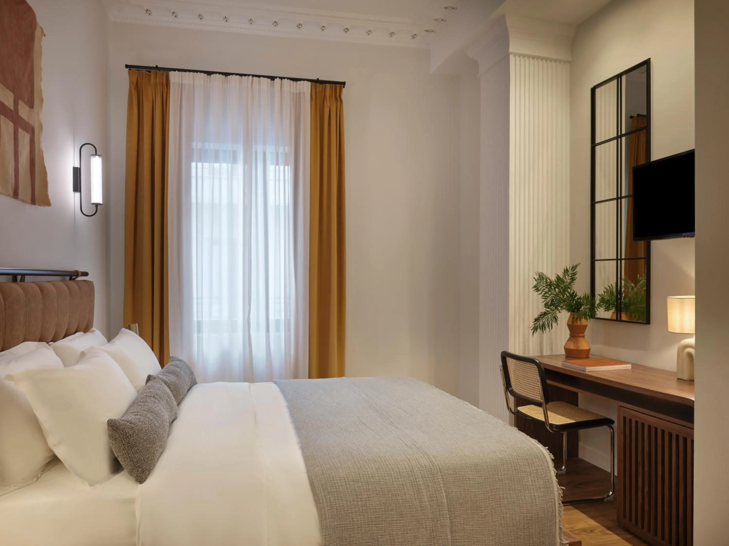 Bed in Astikon House