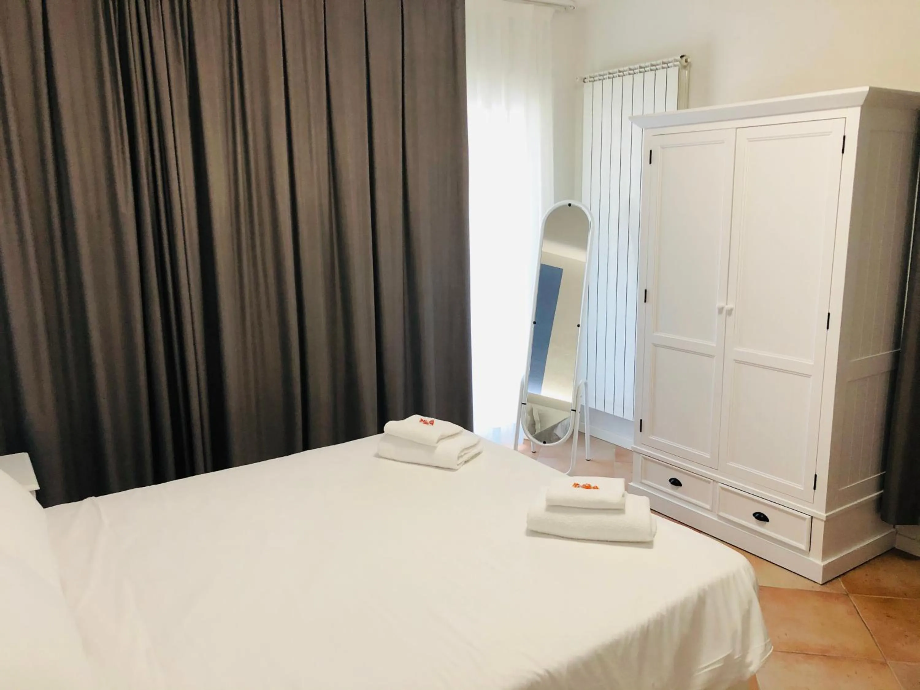 Bed in Bertoletta Village Apartments