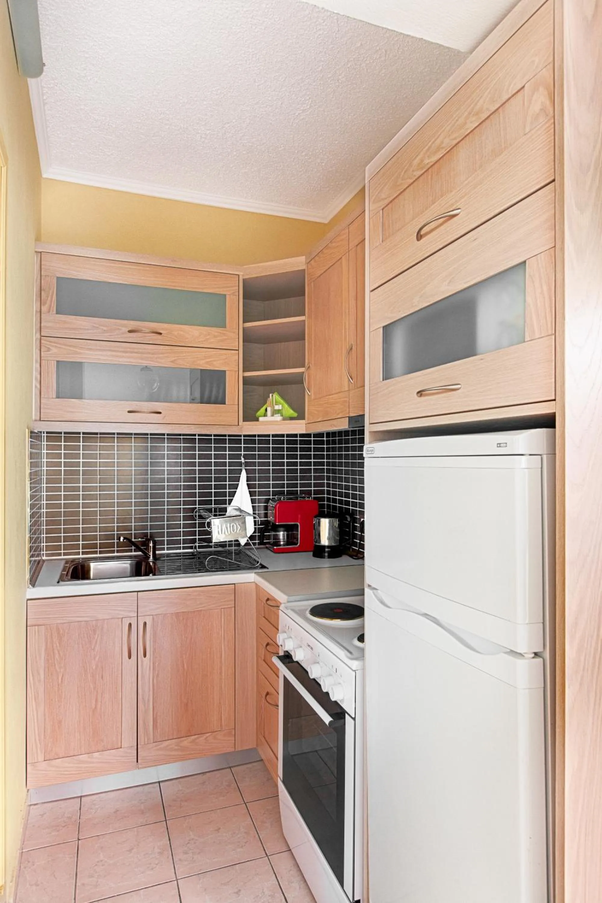 Kitchen or kitchenette in Giorgi's Blue Apartments