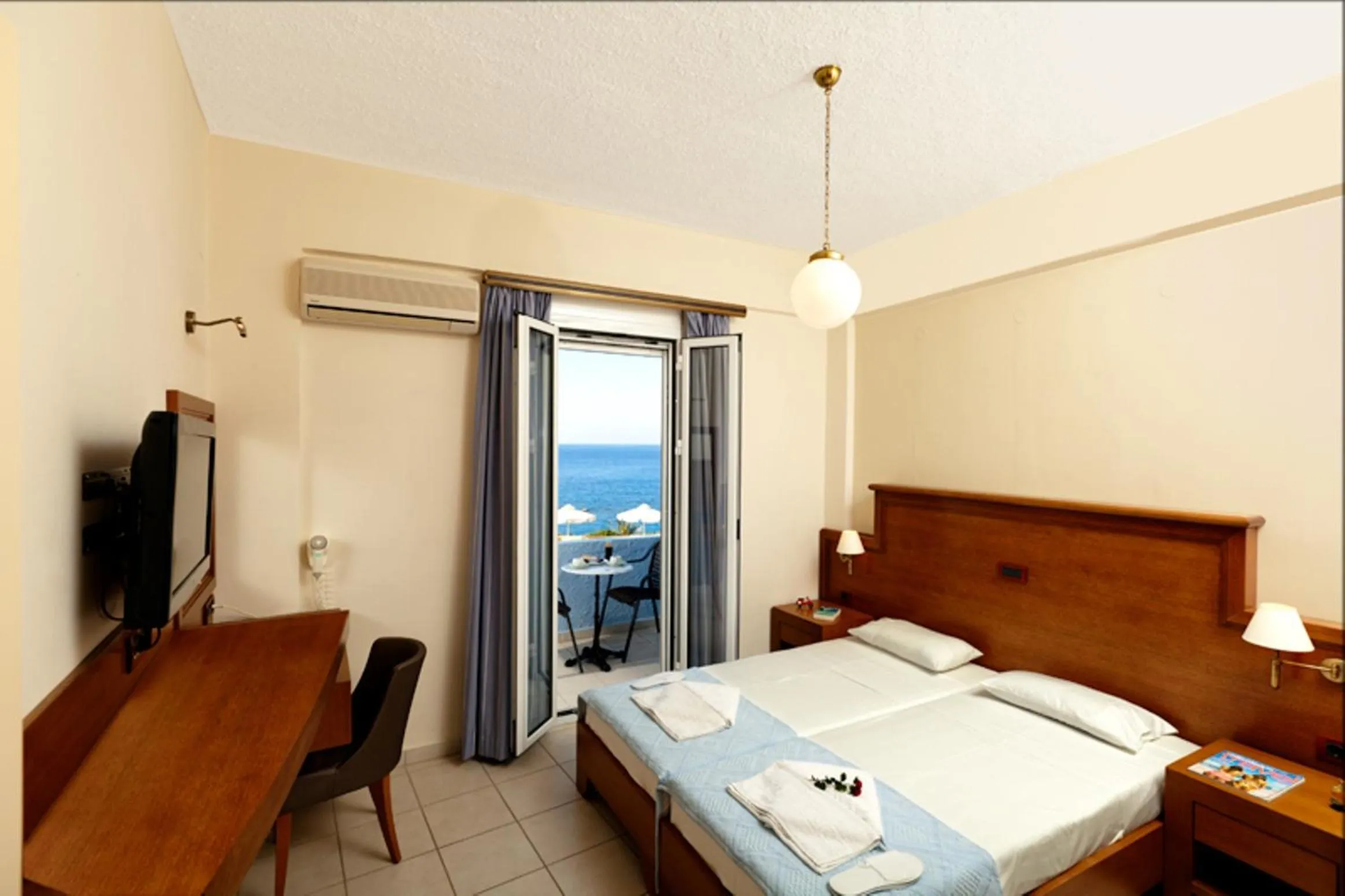 Bed in Giorgi's Blue Apartments