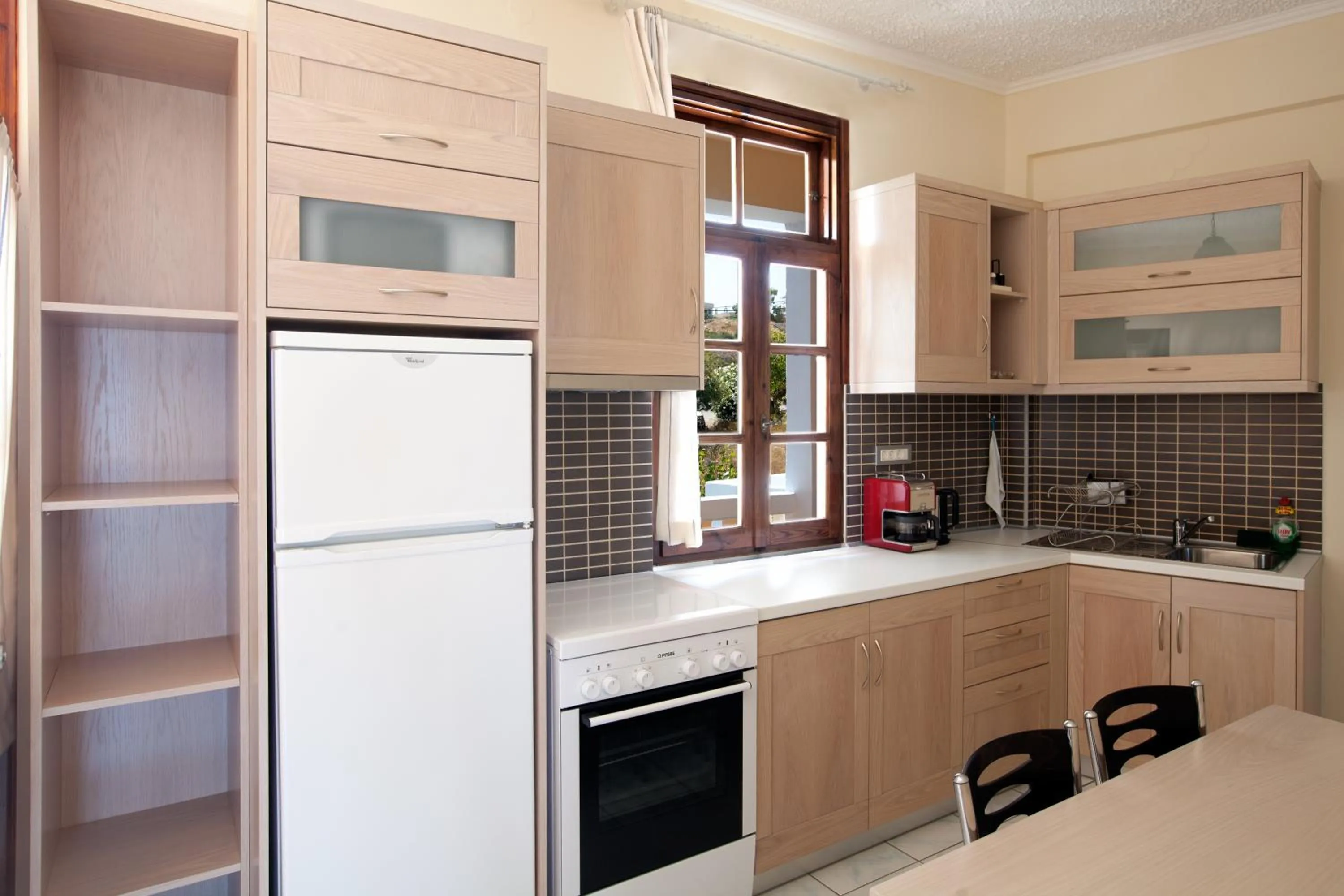 Kitchen or kitchenette in Giorgi's Blue Apartments