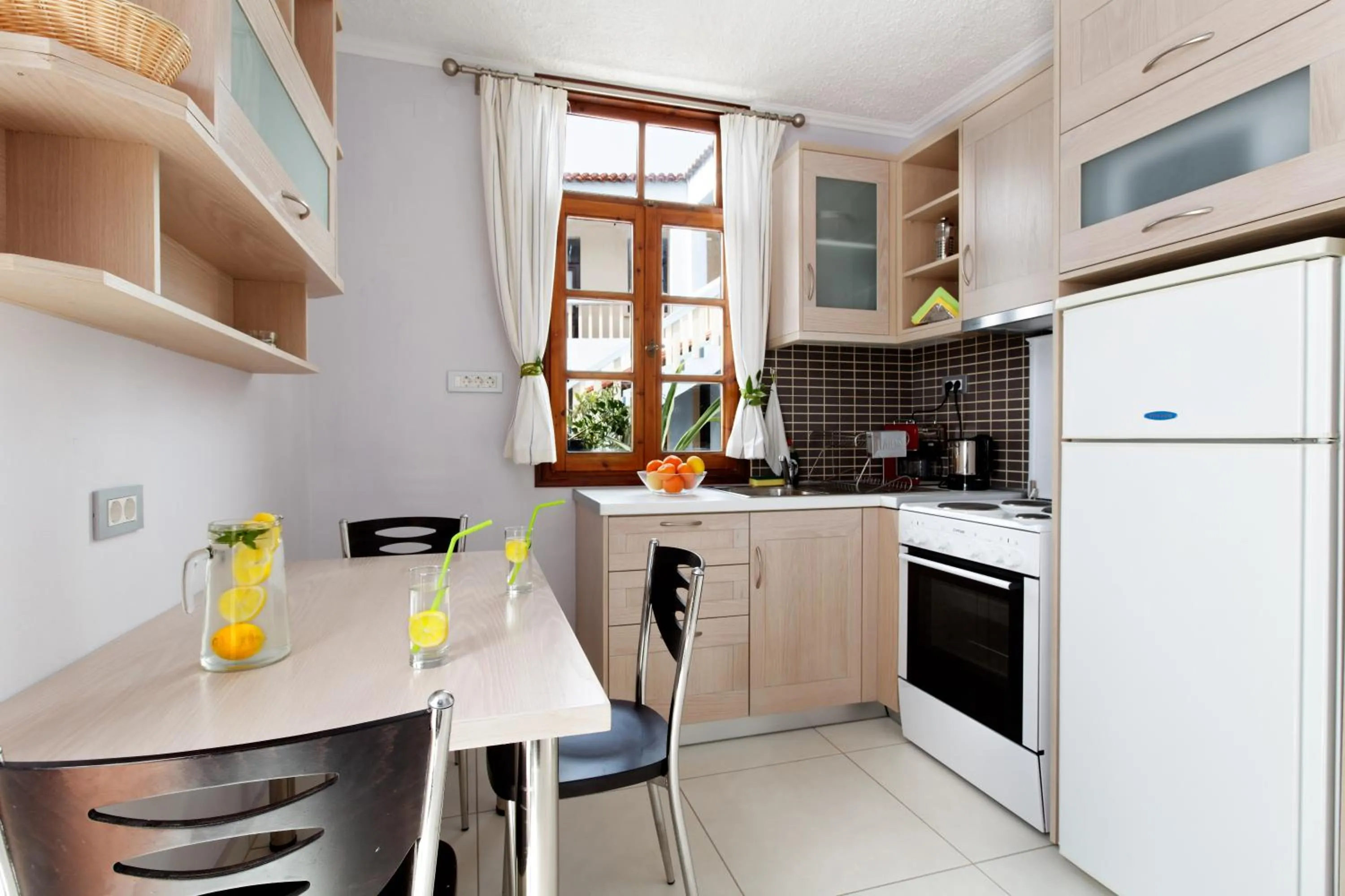 Kitchen or kitchenette in Giorgi's Blue Apartments