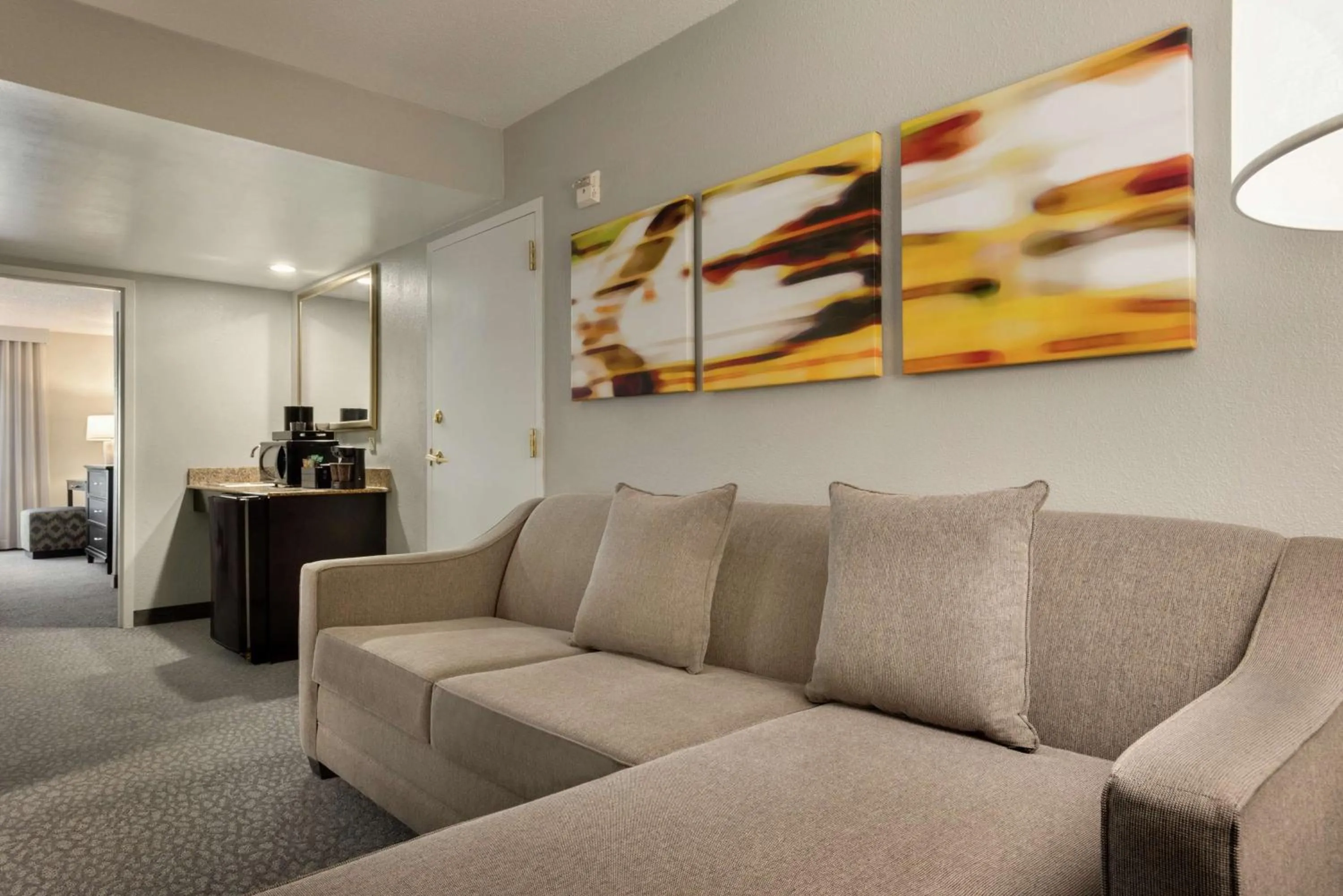 Bedroom in Embassy Suites by Hilton Atlanta Alpharetta