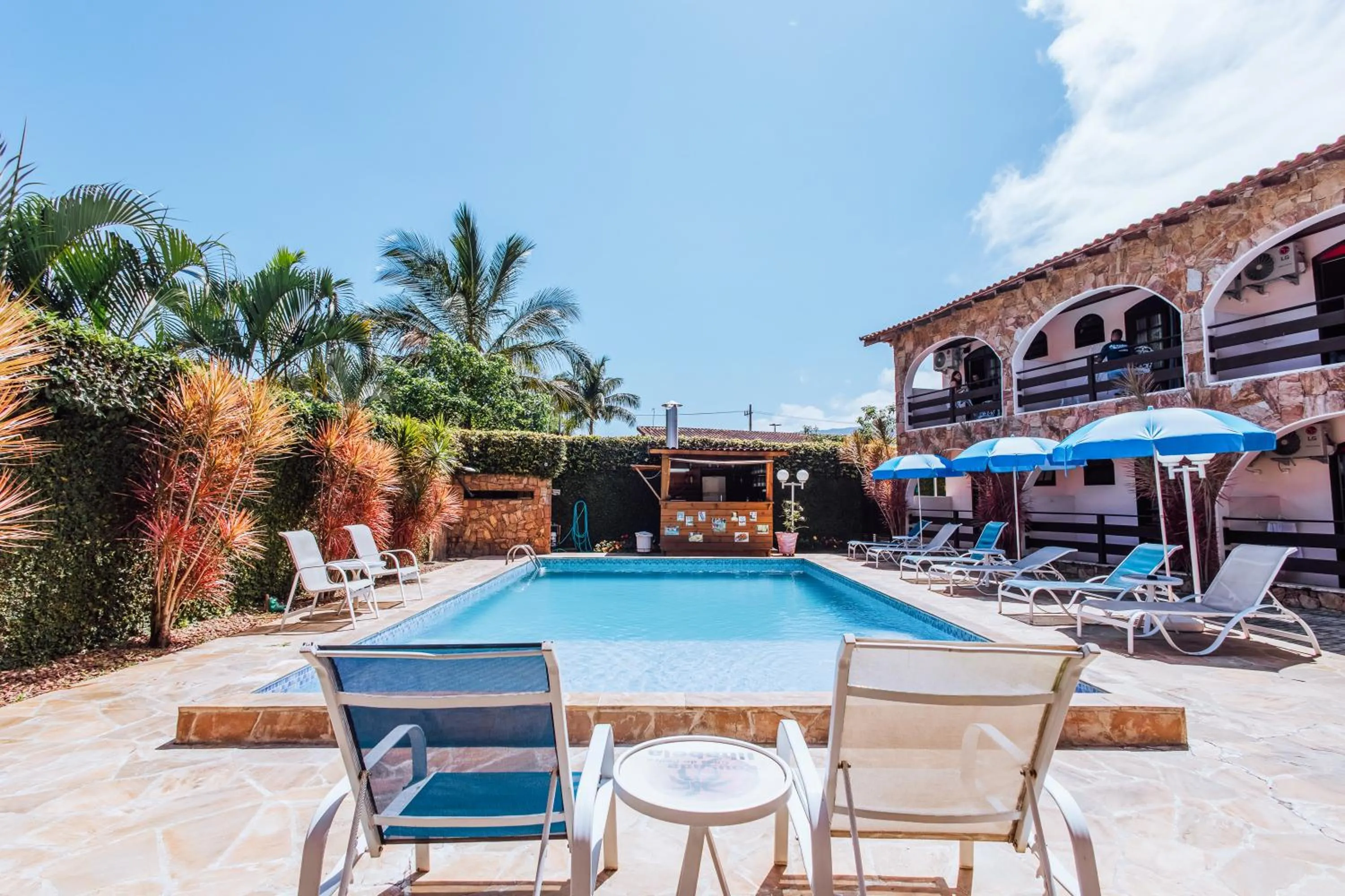 Swimming pool in VELINN Pousada Casa de Pedra Ilhabela