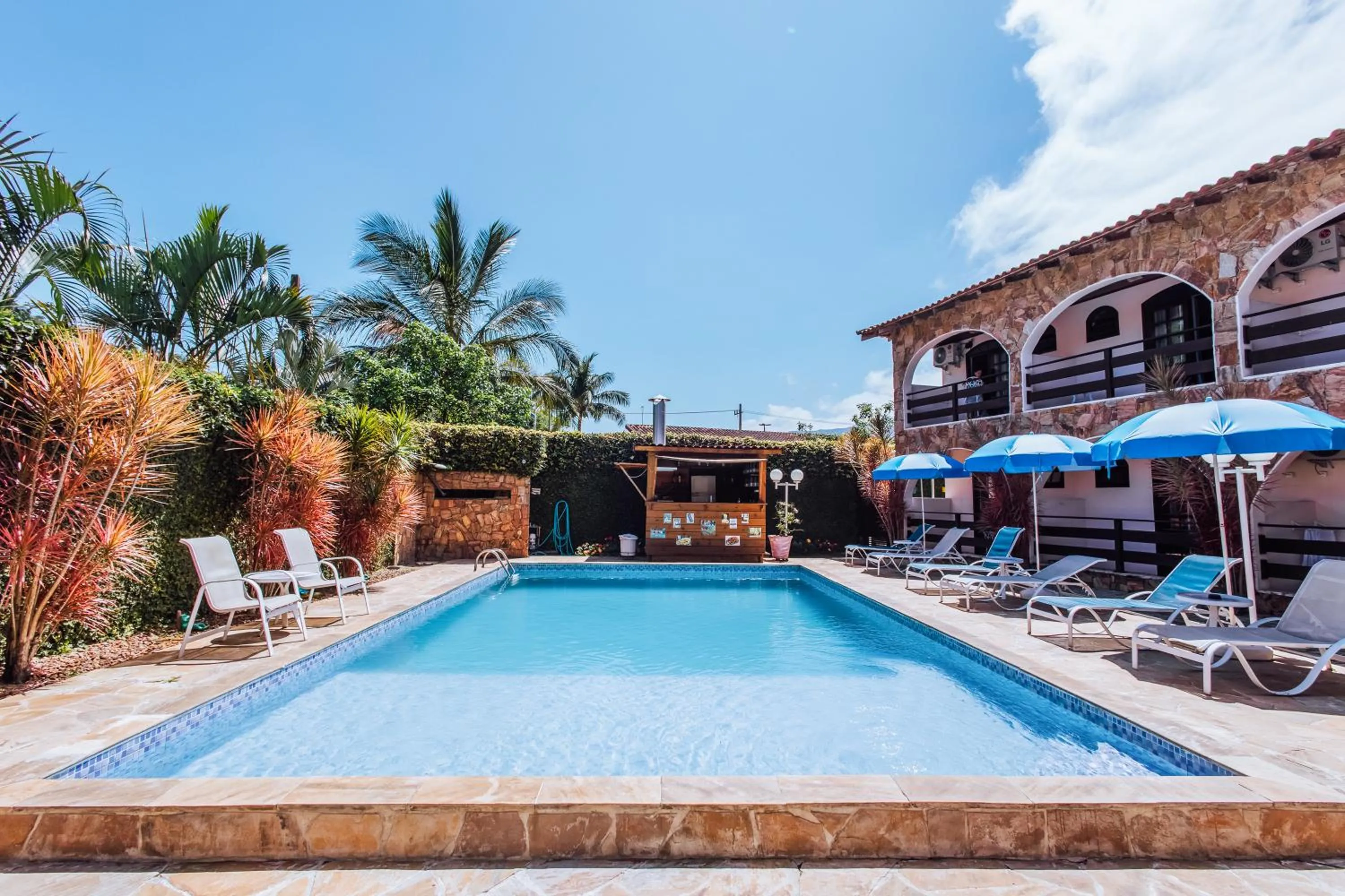 Swimming pool in VELINN Pousada Casa de Pedra Ilhabela