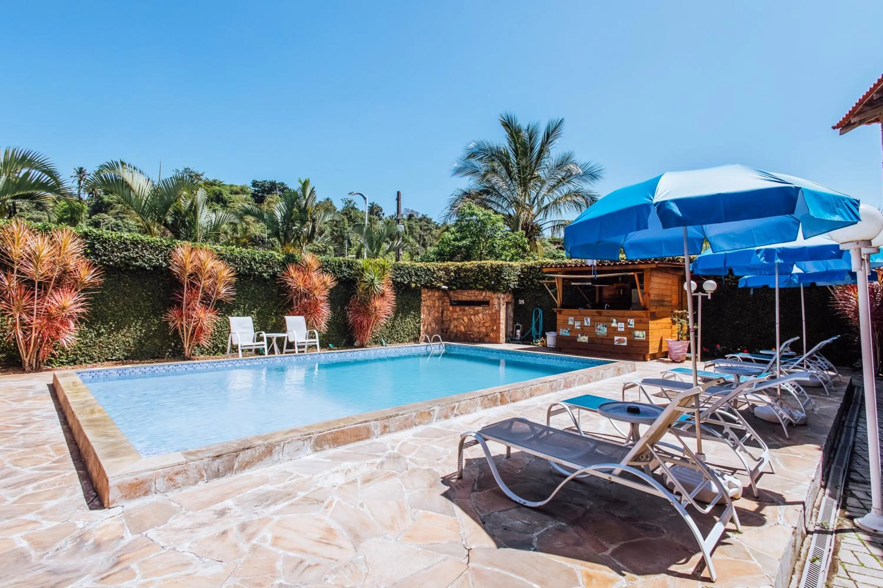 Swimming pool in VELINN Pousada Casa de Pedra Ilhabela