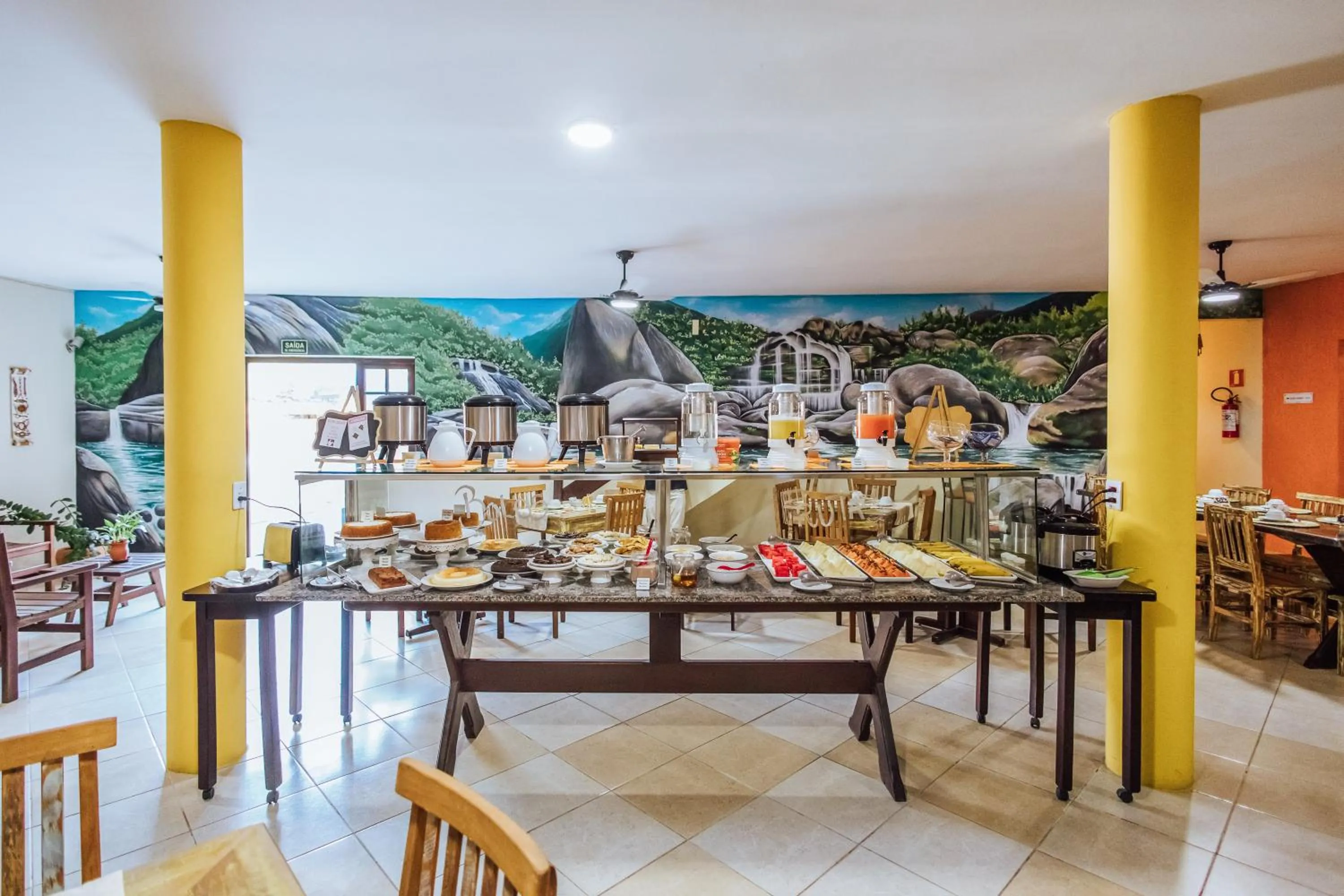 Buffet breakfast in VELINN Pousada Casa de Pedra Ilhabela