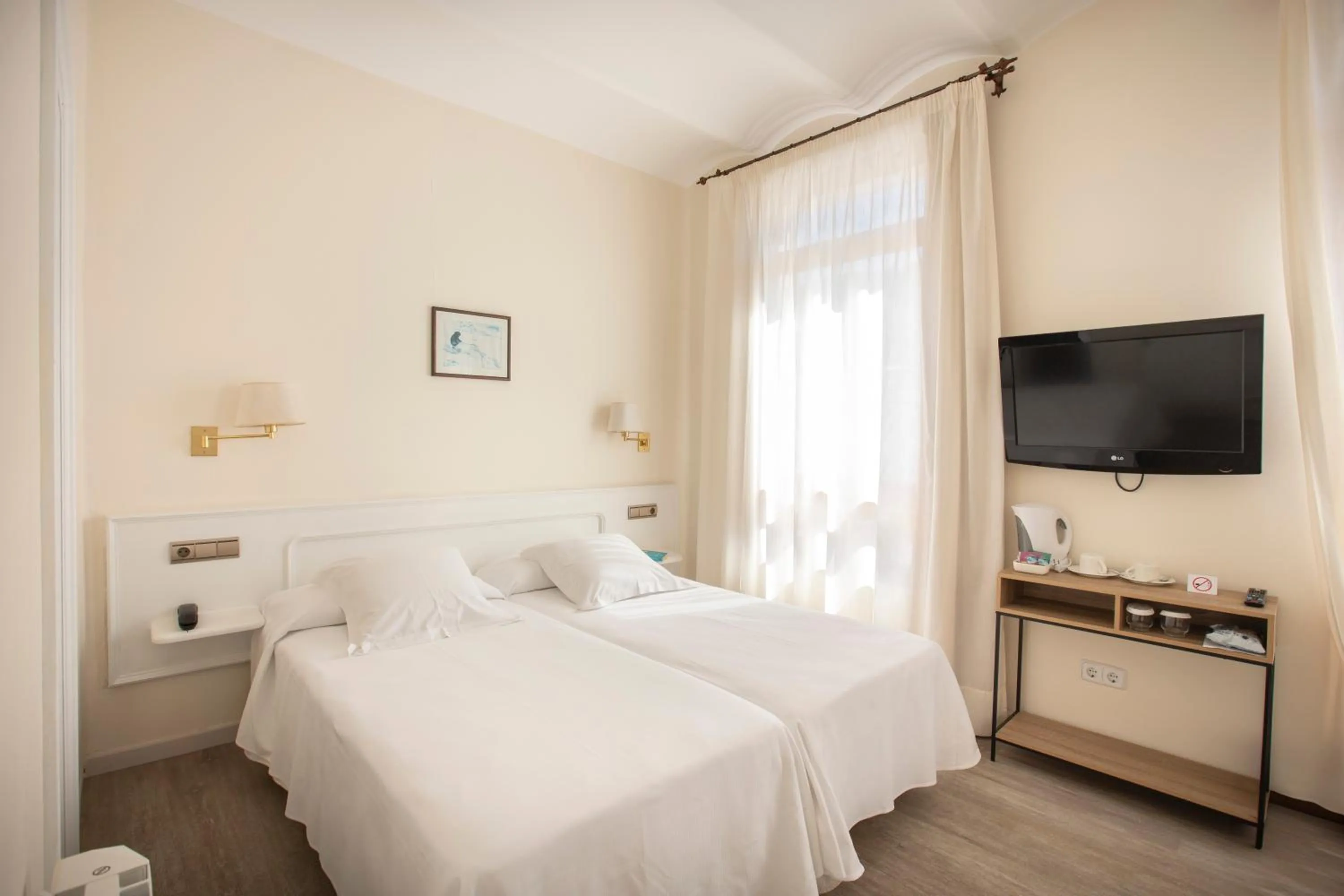 Bed in Hotel Llafranch