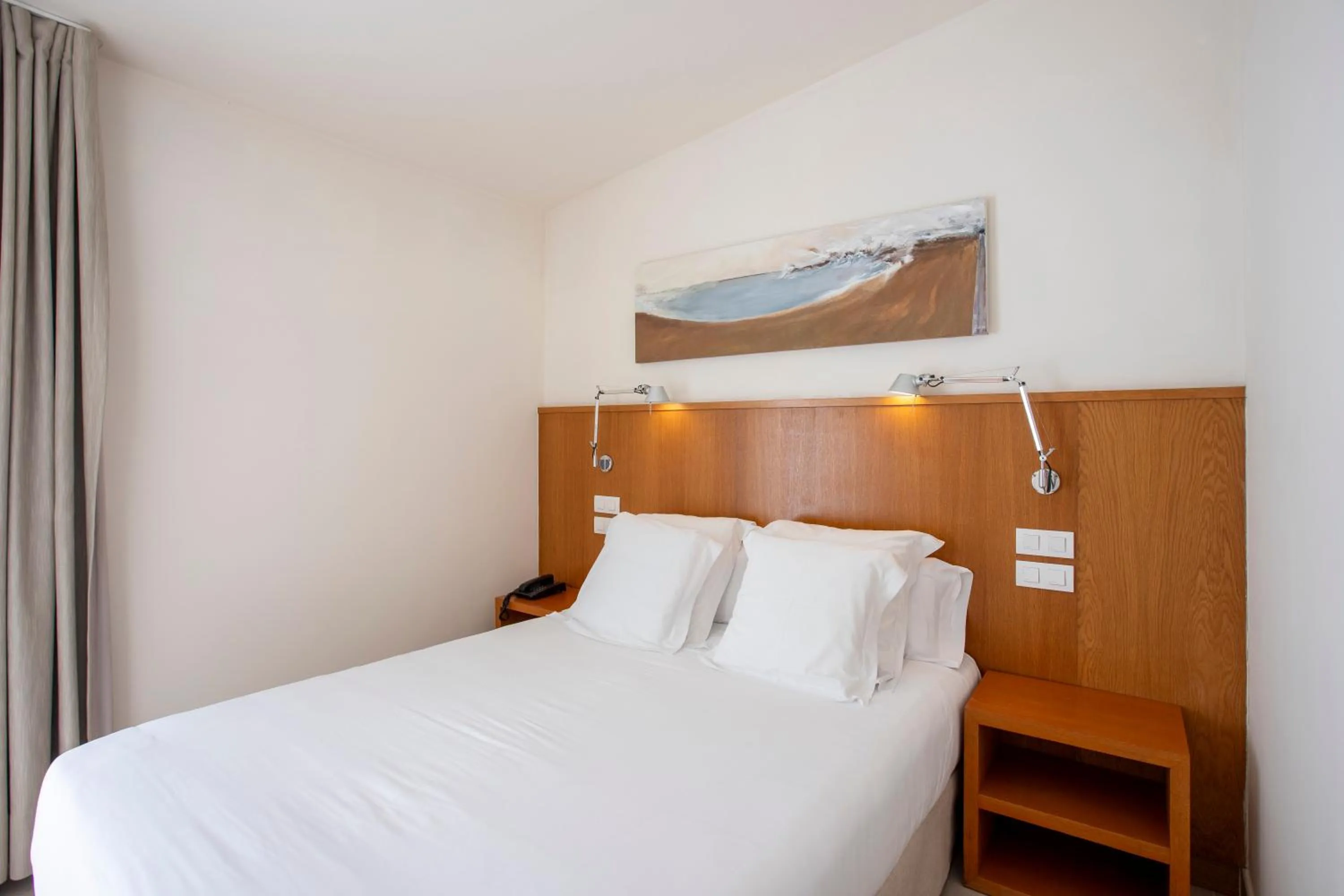 Bed in Hotel Llafranch