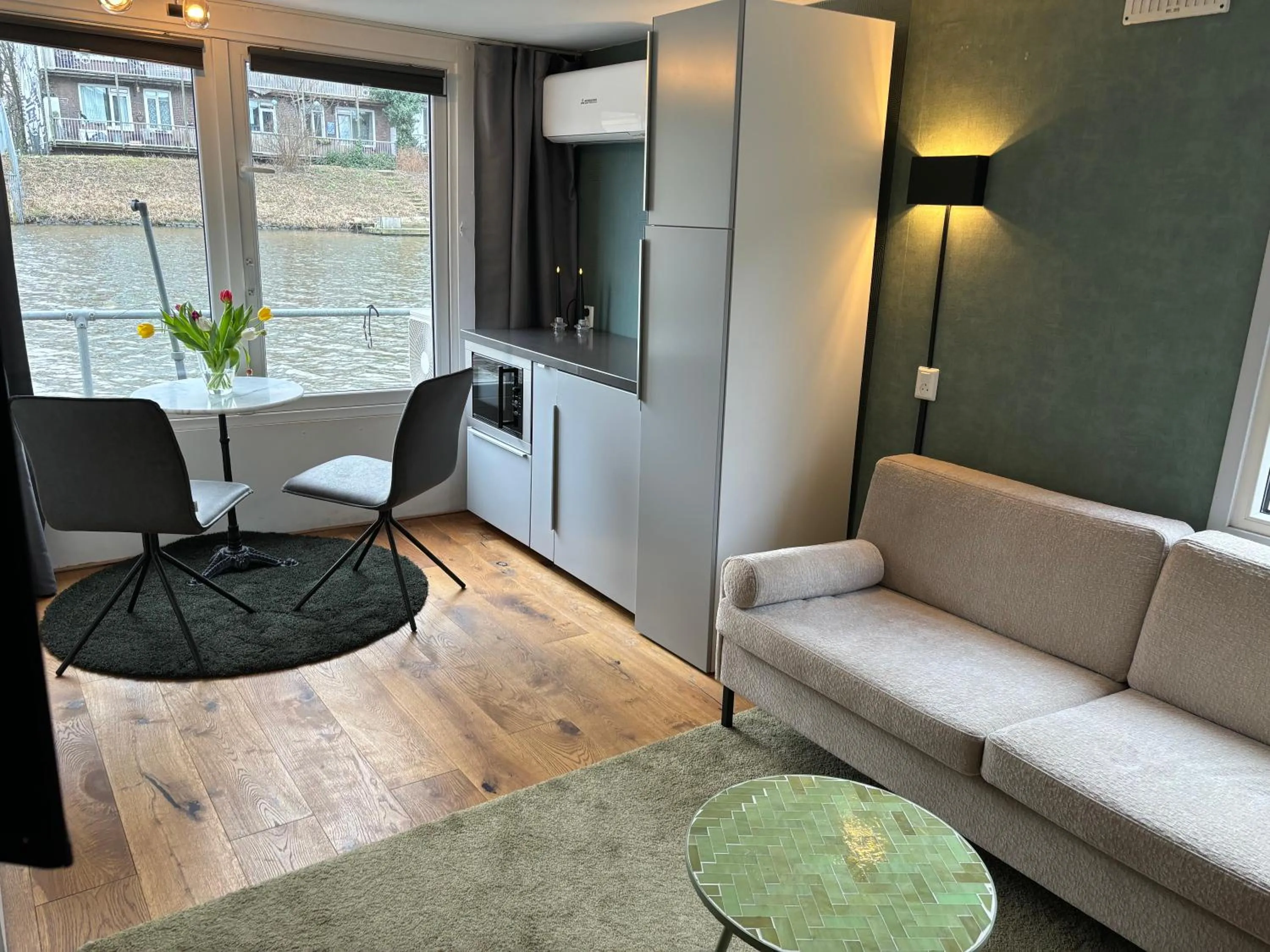 Seating area in Luxury studio on Robs houseboat special for couples
