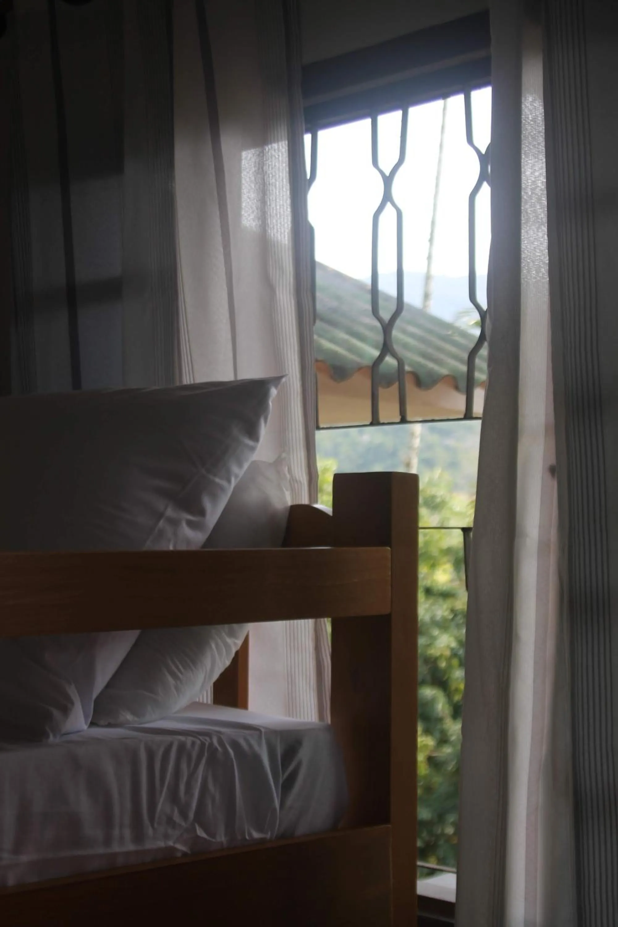 Bed in Pousada Sol do Araçá